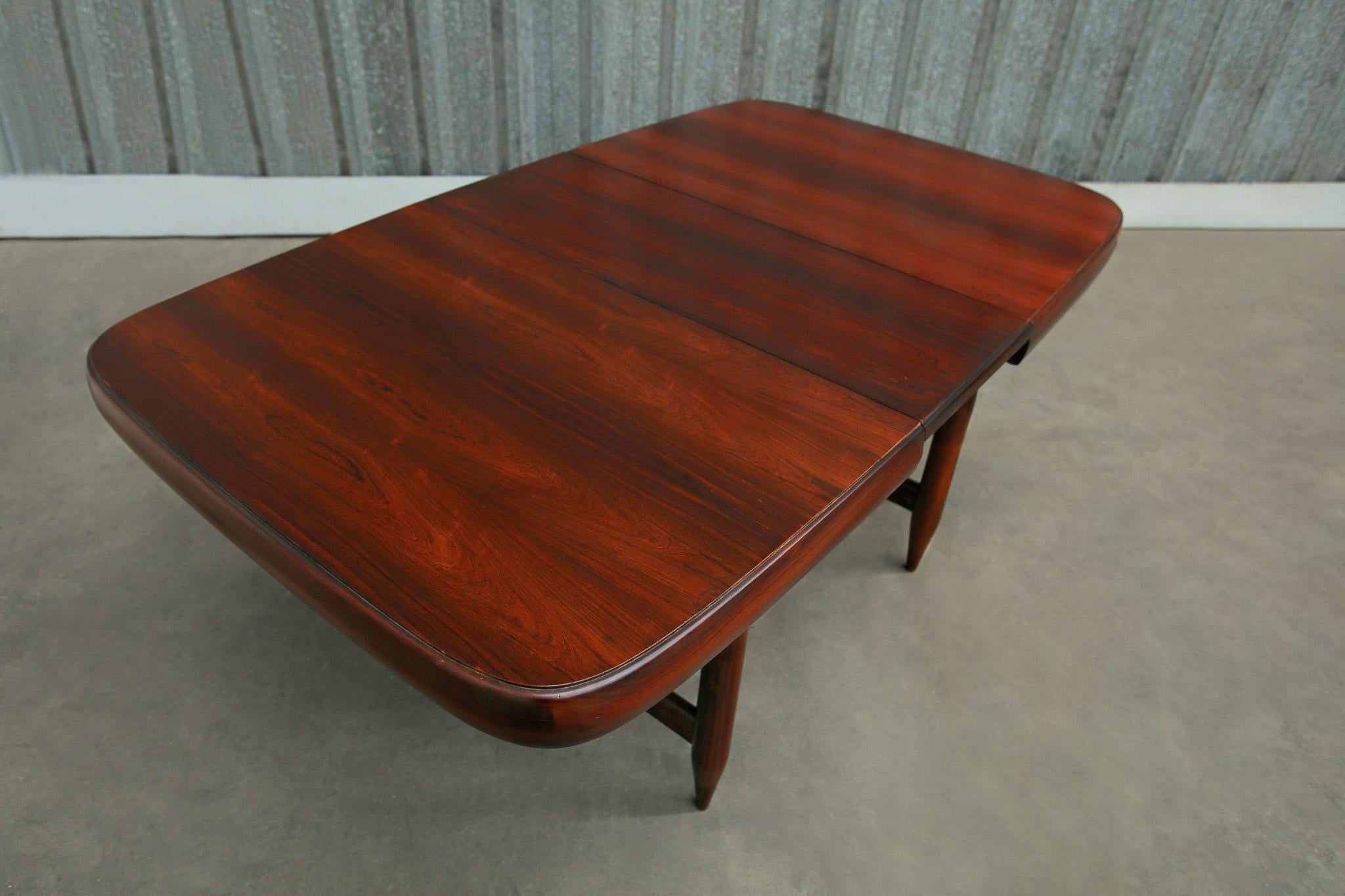 Available now, this Midcentury Expandable Dining Table in Hardwood by Sergio Rodrigues made in the 60s in Brazil is a true one-of-a-kind piece. 

The table is entirely made of Brazilian Rosewood, known as Jacaranda and consists of four “bowling