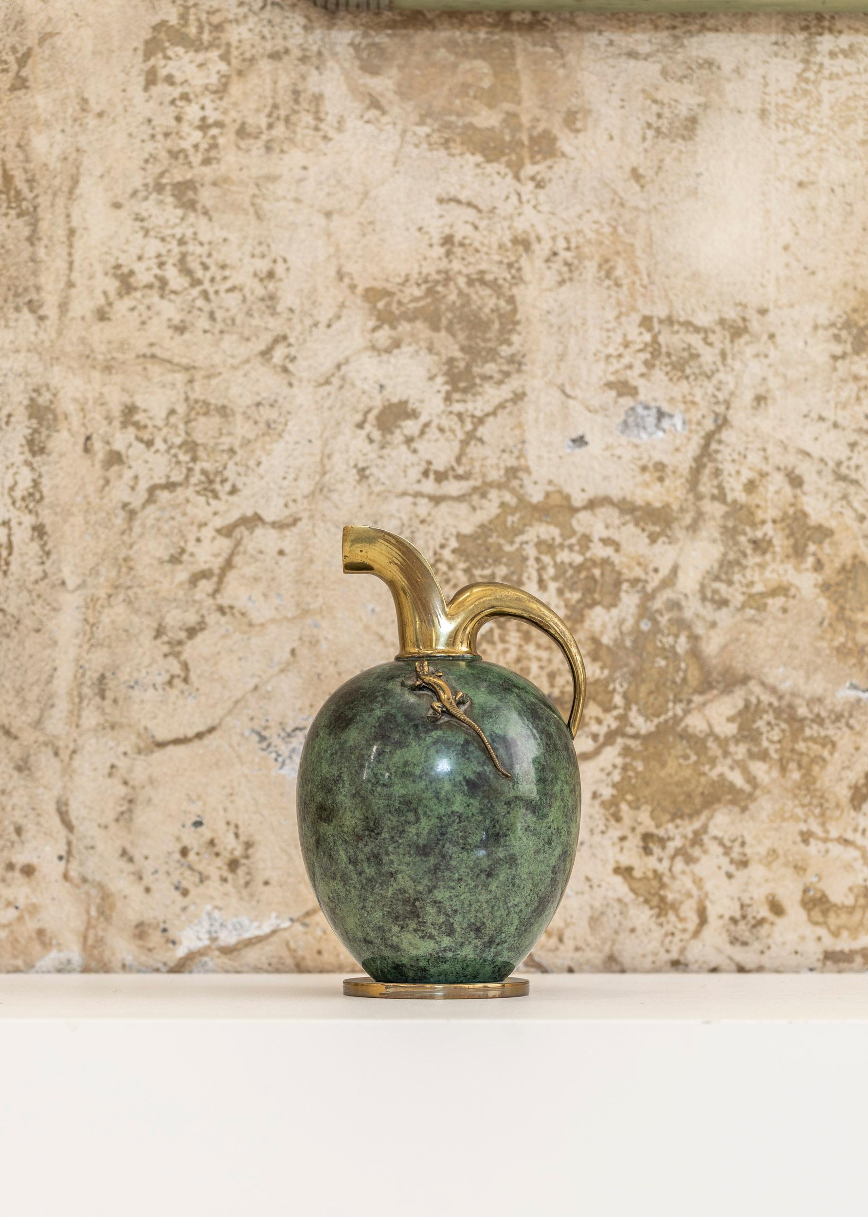 Stunning faux marbre brass pitcher with nice climbing in the style of Aldo Tura.