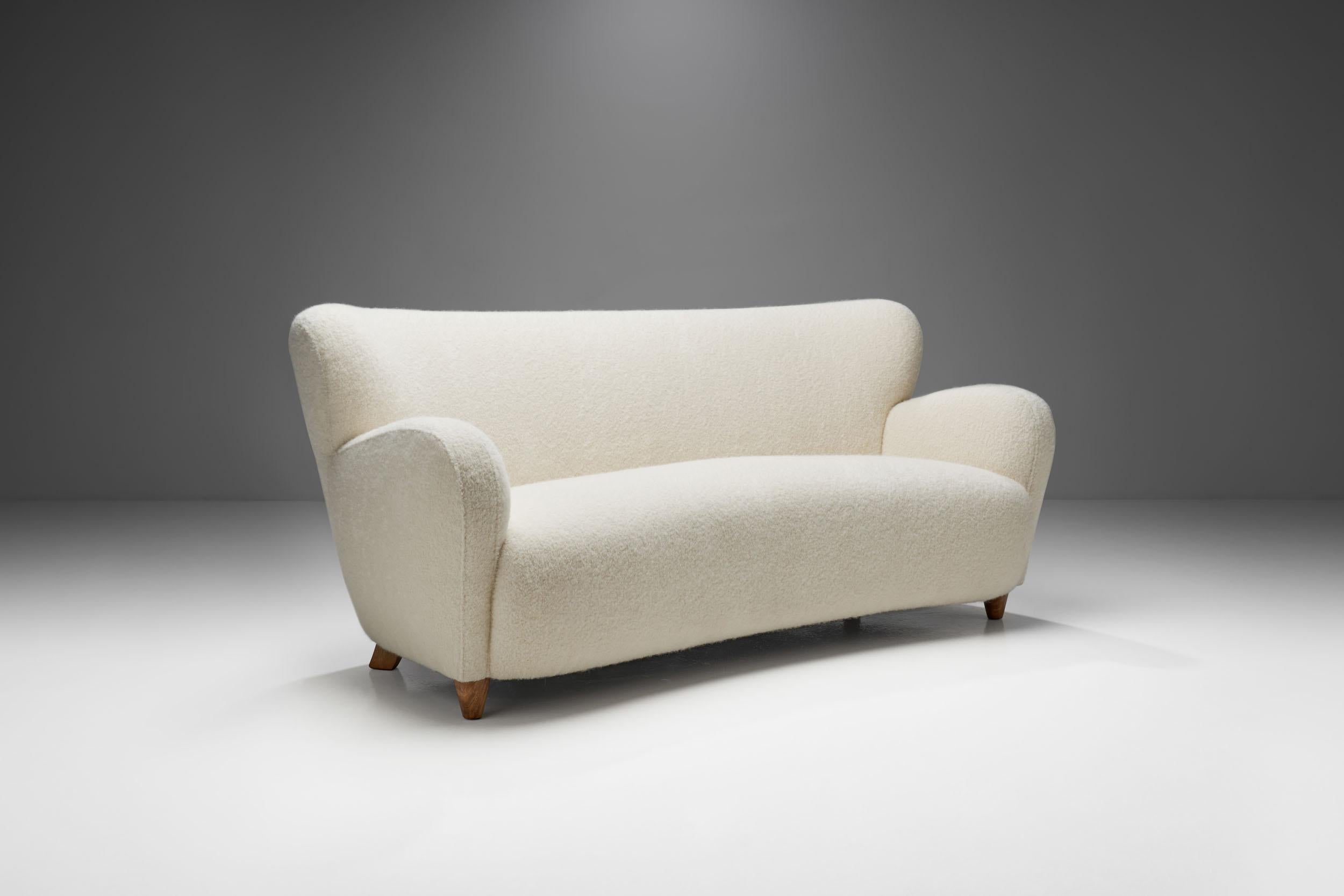 The Nordic perspective on cabinetmaking is exceptional, and Finland is no exception, quite the opposite. Wood is omnipresent in the Nordics, and Finnish woodworking is world-famous for its traditions.

This three-seat sofa is immensely elegant,