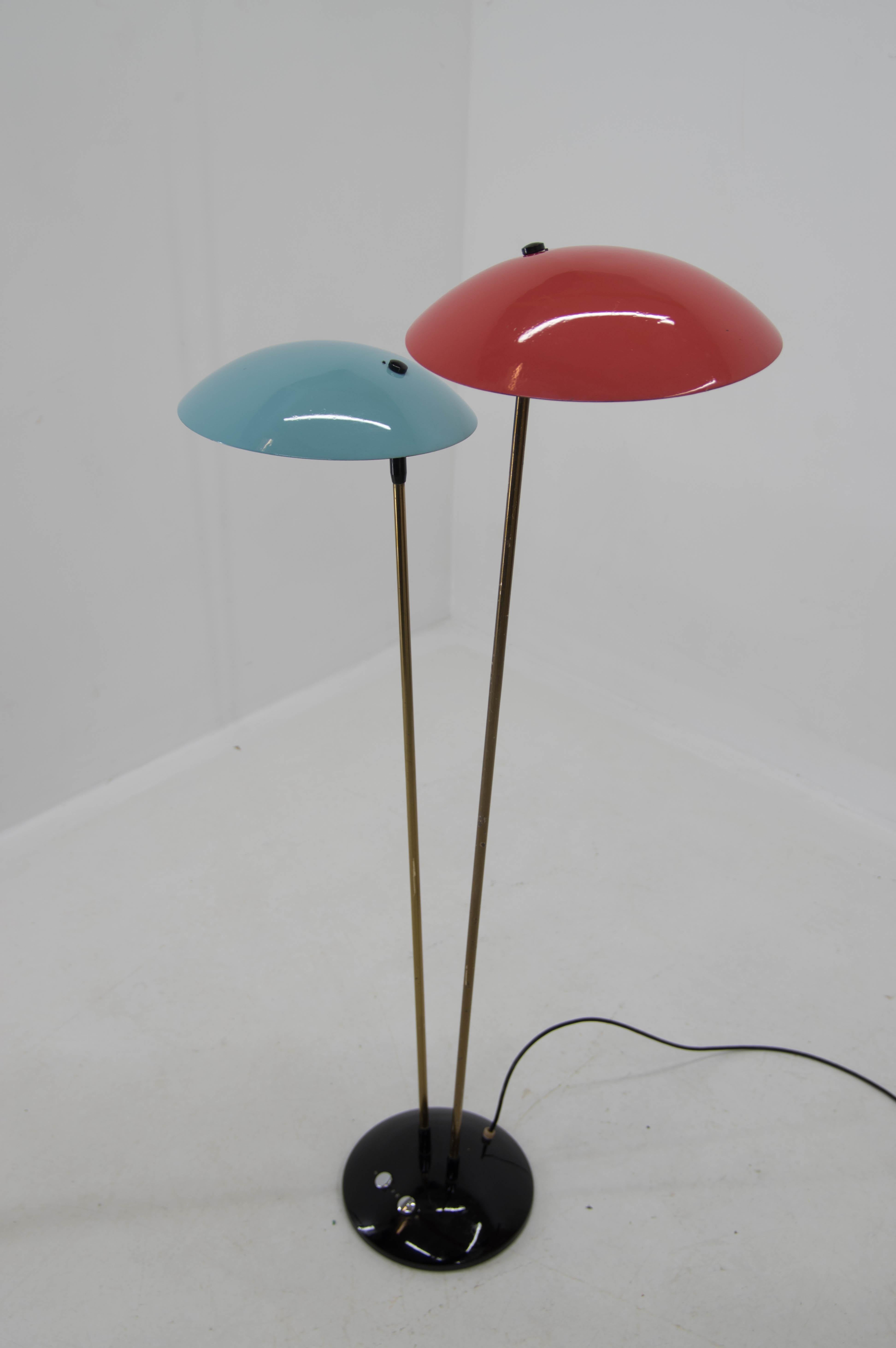 Rare iconic floor lamp by Drukov. Very good original condition with only minor scratches. Cleaned, polished, rewired. 2x60W, E27 or E27 or E26 bulbs. Two separate switches. US plug adapter included.