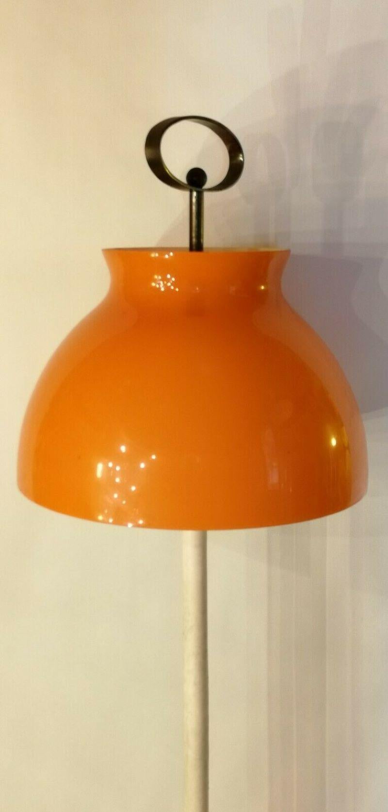 original floor lamp from the 1950s, probably stilnovo production

supporting structure in metal covered in white eco-leather, base in white carrara marble and diffuser in bright orange bell-shaped blown Murano glass

Very good condition, as