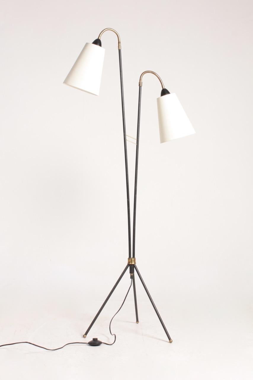 Great looking floor lamp in black metal and brass. Comes with new fabric shades. Designed and made in Denmark.