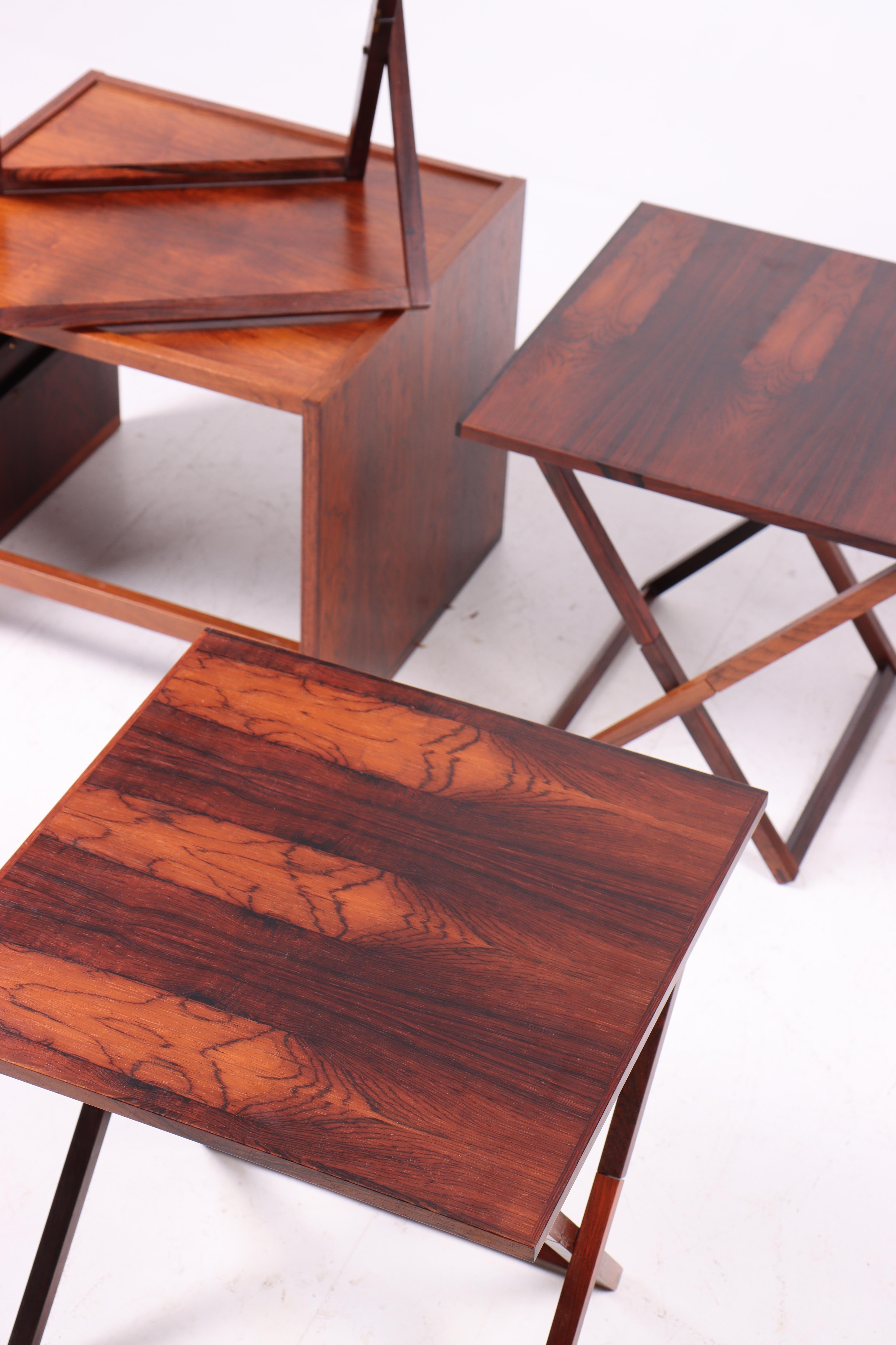 Folding Tables in rosewood, designed by Illum Wikkelsø. Great original condition.