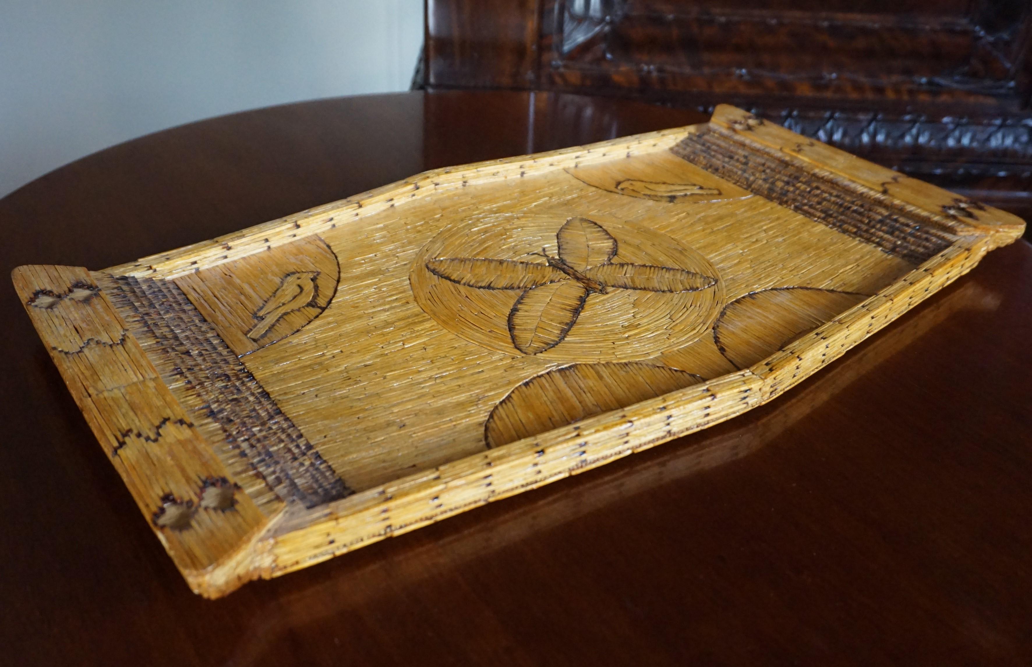 Unique folk art serving tray in mint condition.

Folk Art made of burnt matches is rare art and we have never seen a piece of this size, let alone in this amazing condition. This museum quality serving tray has been looked after extremely well,