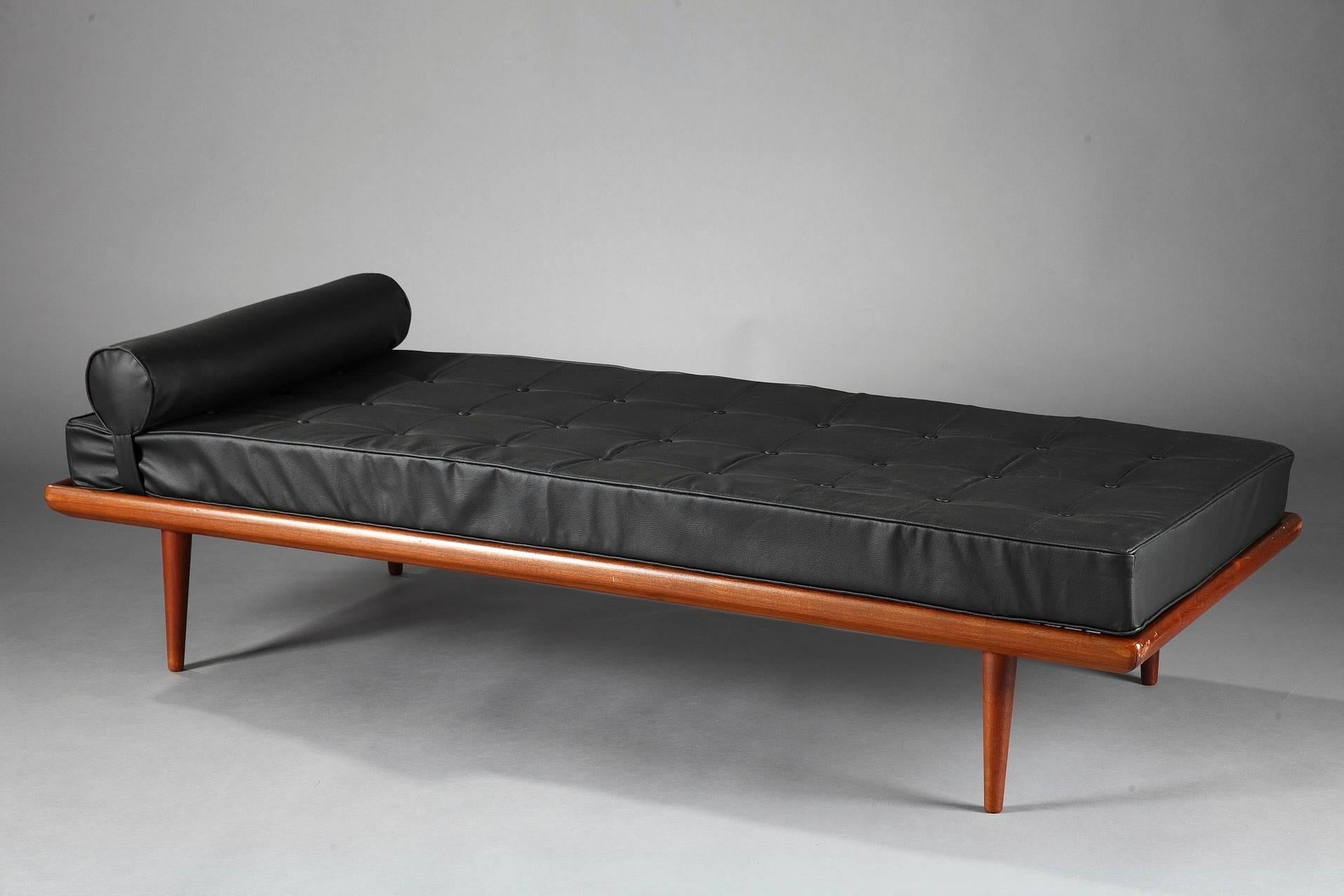 Midcentury daybed with wooden structure and black leatherette upholstered seat and cushion. Designed by Peter Hvidt (1916-1986) & Orla Mølgaard Nielsen (1907-1993). Manufactured by France & Daverkosen, Denmark. The cushion is removable. Marked on