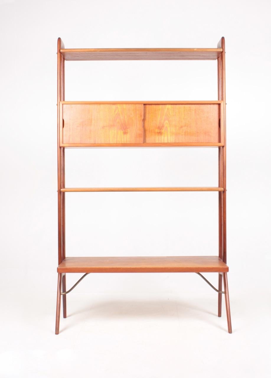 Bookcase in teak designed by Kurt Østervig M.A.A. for K.P furniture in 1960s. Made in Denmark, great condition.