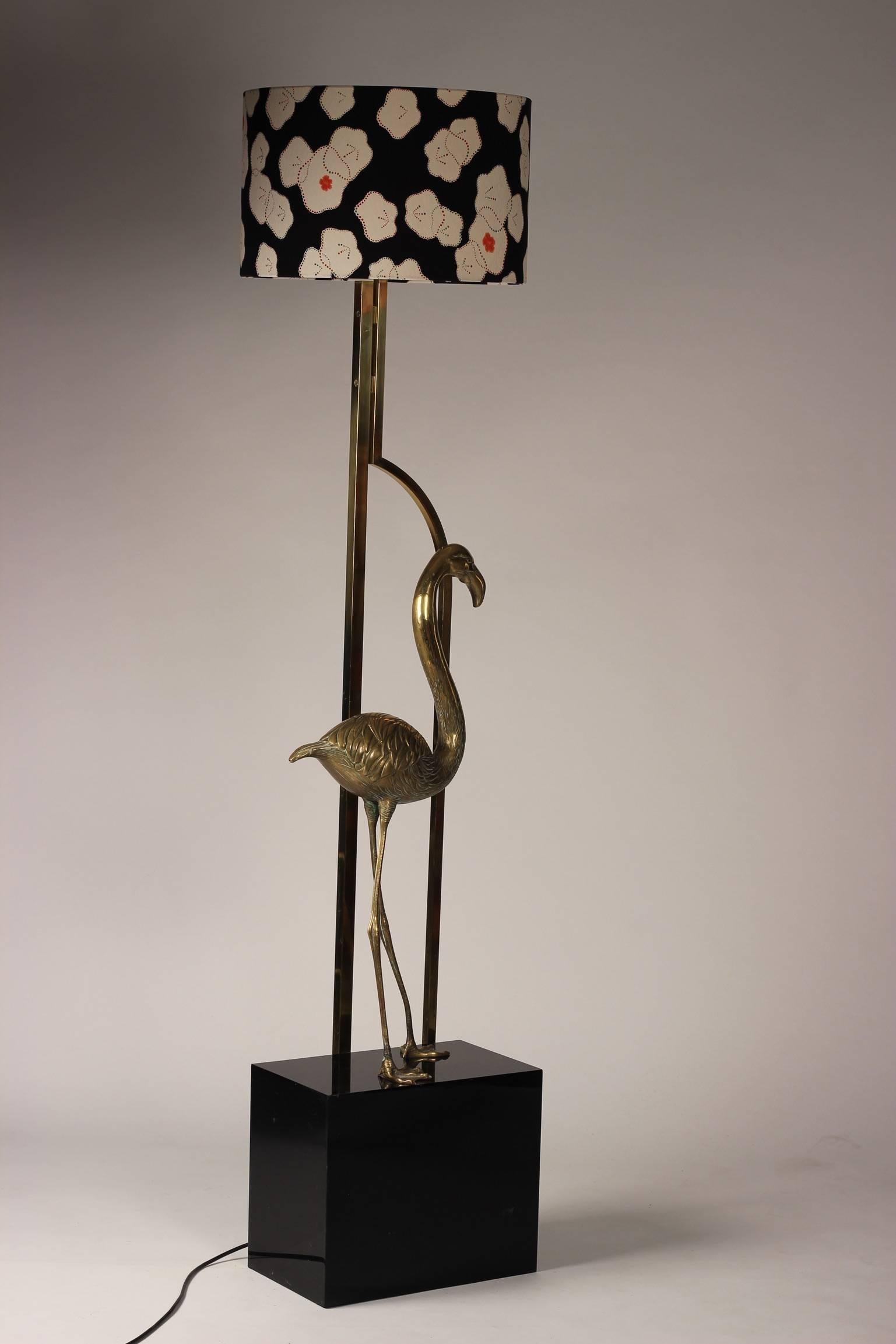 A beautifully modelled and crafted brass flamingo floor lamp, possibly by Maison Charles. This mid Century Modern Floor light stands tall and elegant and is now topped with a Lampshade made from vintage Kimono fabric, which echoes the flamingos foot