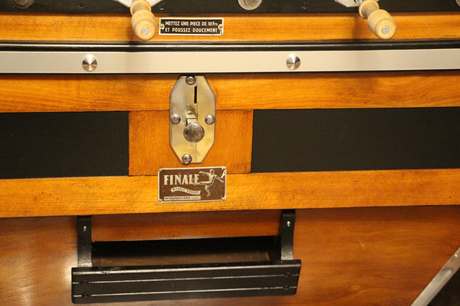 vintage foosball table with ashtrays