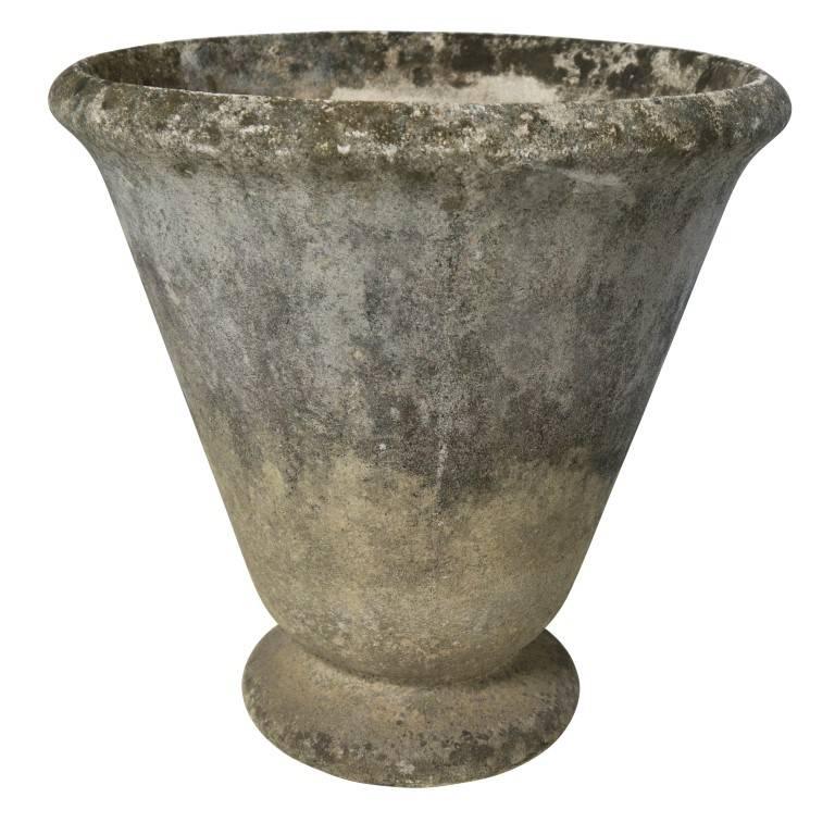 Chic Minimalist style and lovely natural occurring patina make this lovely rare set of cement planters an understated treasure for the home, garden or professional environment.
