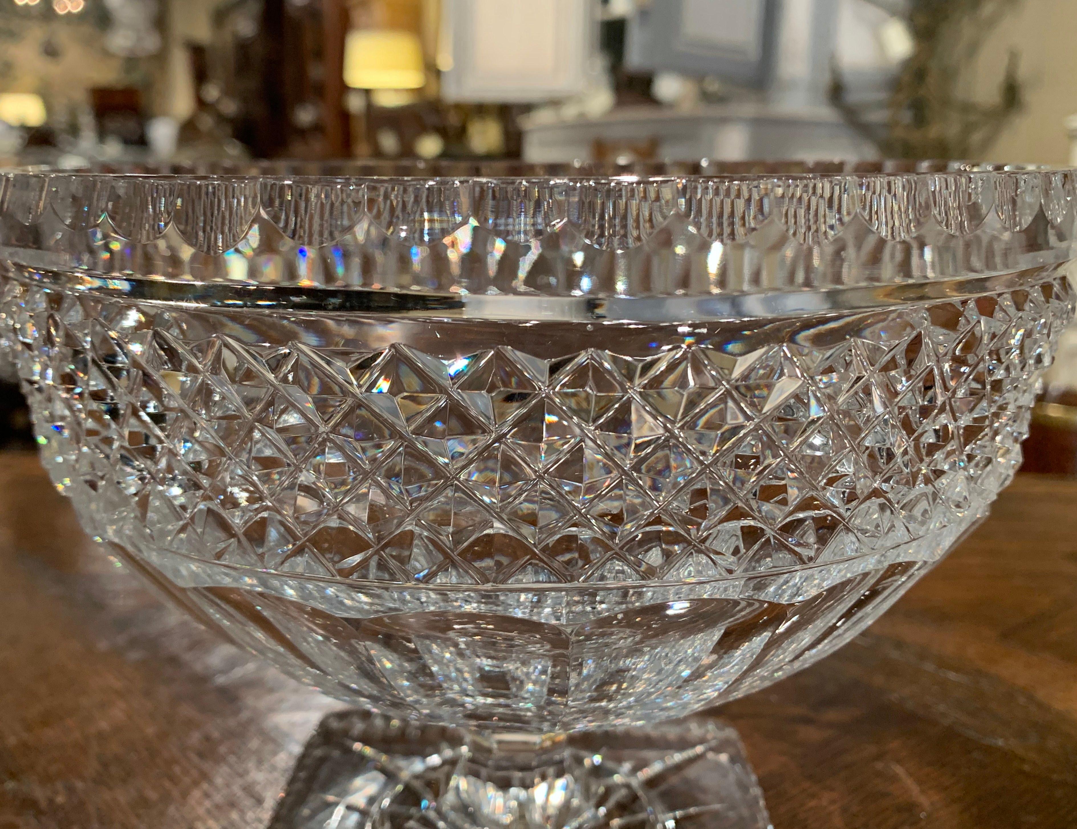 Place this oval bowl on a entry table or console; crafted in France, circa 1970, the crystal compote centerpiece sits on a square base and features cut glass decor throughout. The decorative dish is in excellent condition.
Measures: 8