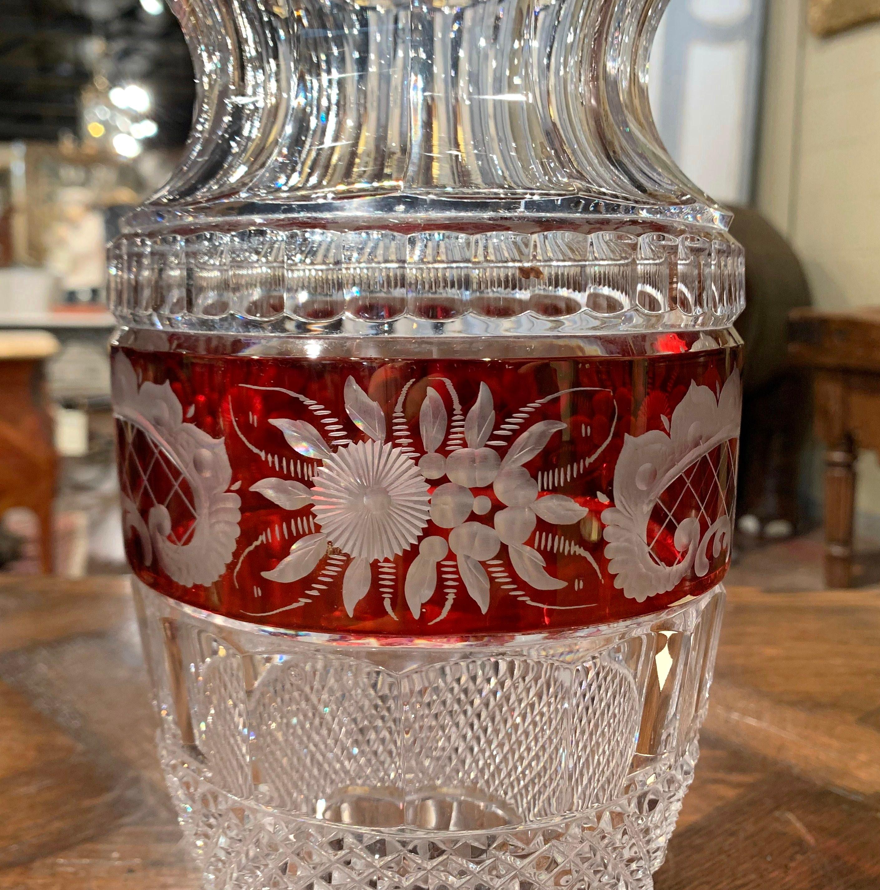 Decorate a side table or console with this elegant vintage vase. Crafted in France, circa 1970 in the manner of the Saint Louis factory, the tall neoclassical vase sits on a round base and embellished with a wide mouth at the top. The Classic,