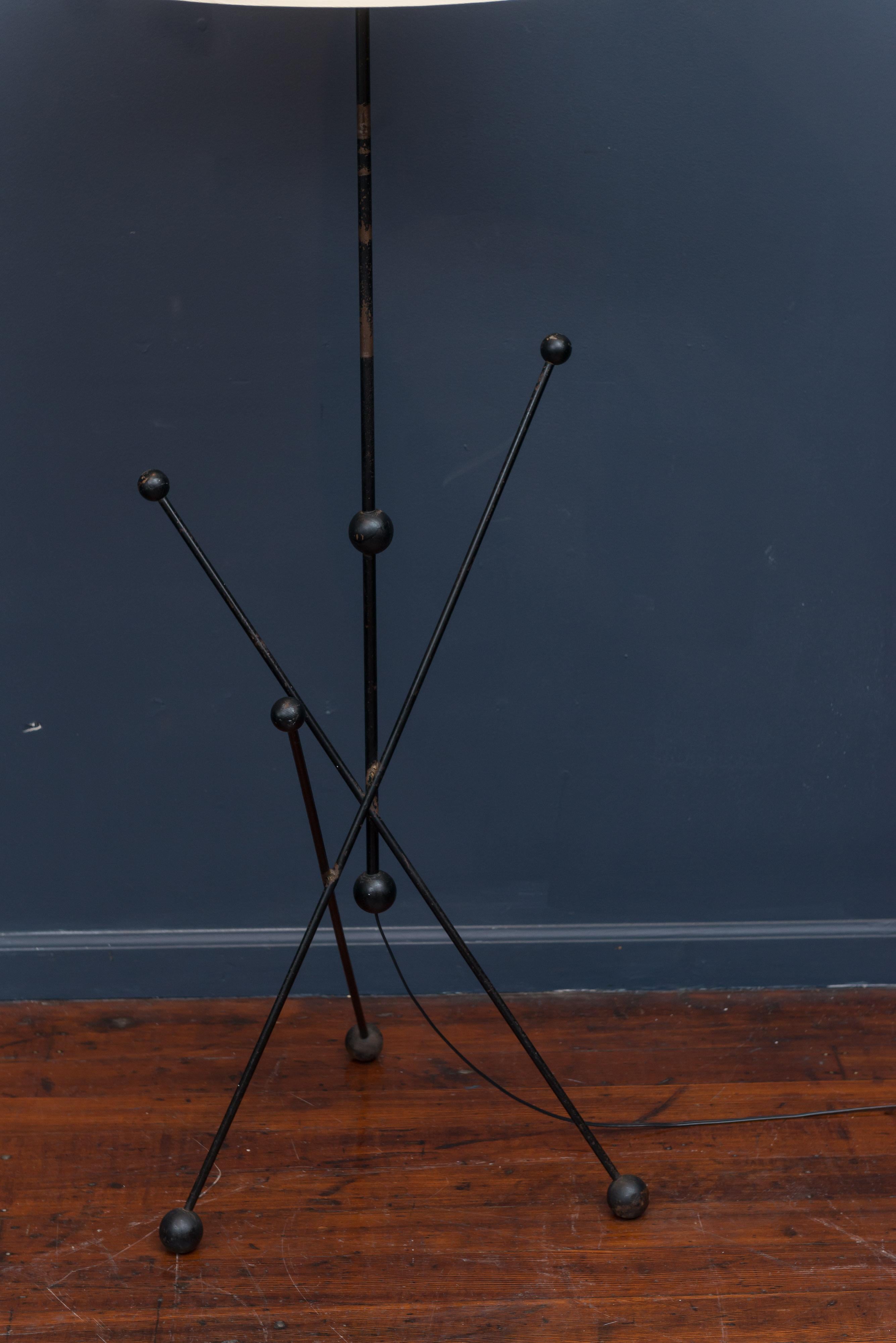 Midcentury black lacquer and steel floor lamp, newly rewired and ready to enjoy. Patina to metal and wooden balls throughout, possibly French in origin. Shade not included.