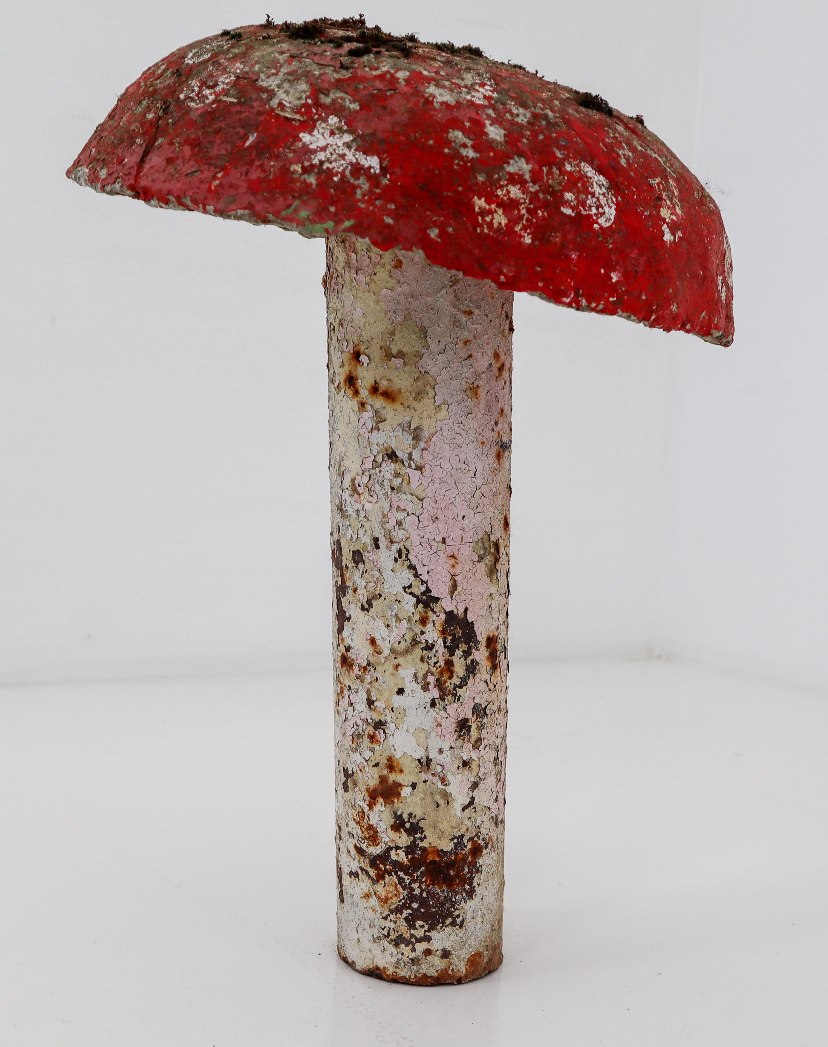 Found in France, this cement mushroom serves well as a whimsical garden element. Great color and patina.