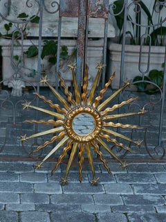 Midcentury French Giltwood Sunburst Mirror with Star and Cloud Motifs