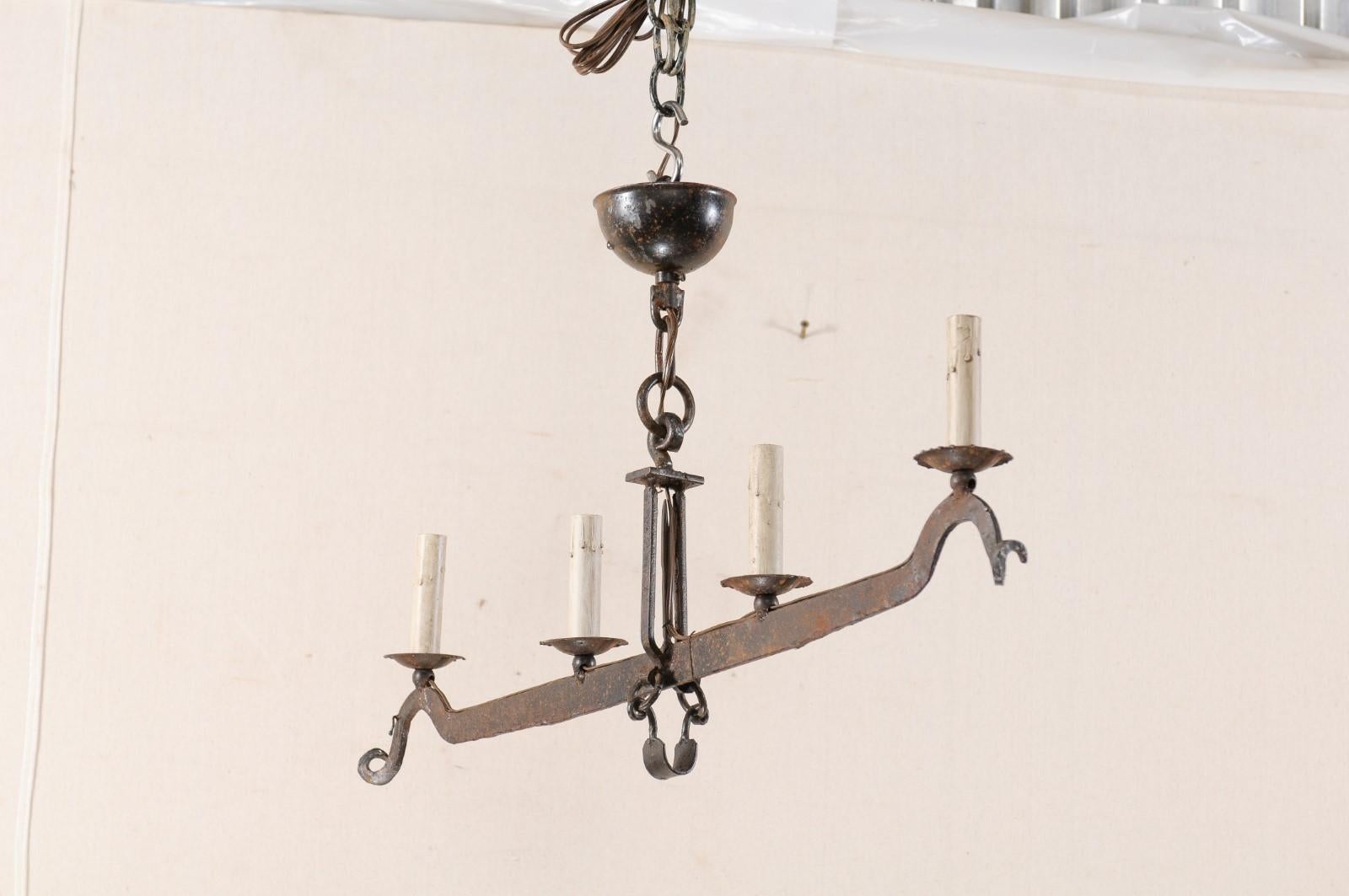 Patinated Midcentury French Iron Scale 4-Light Chandelier