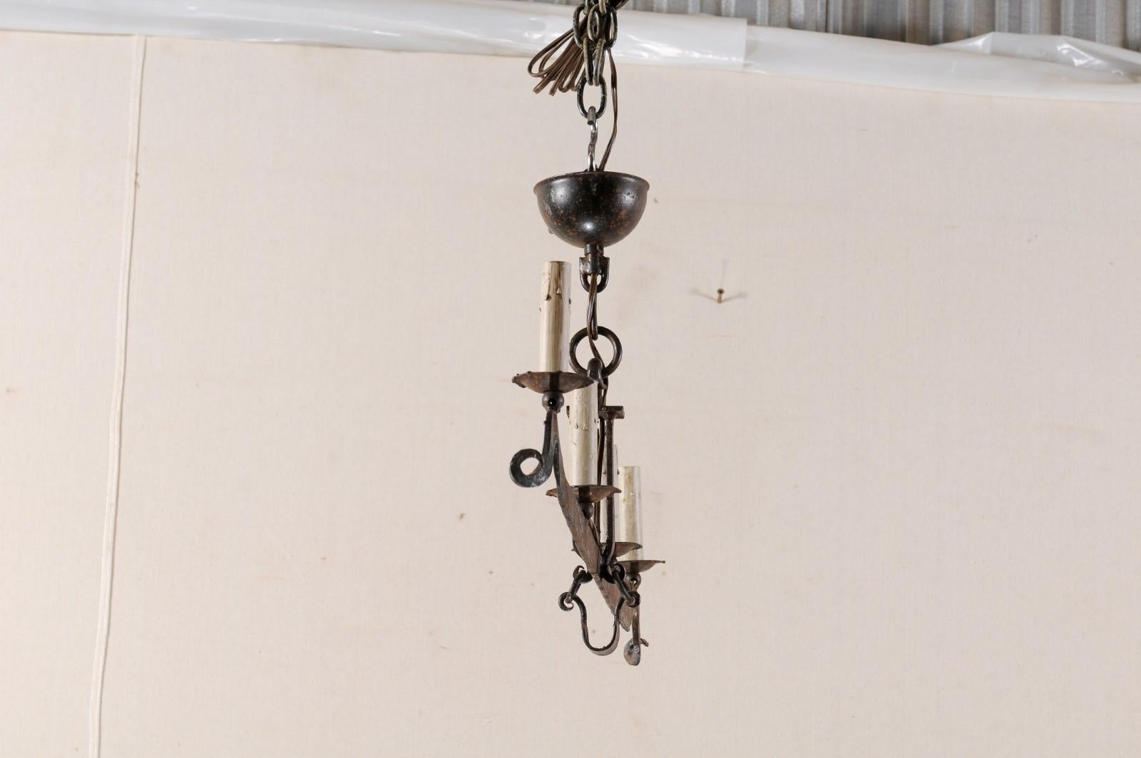 Midcentury French Iron Scale 4-Light Chandelier In Good Condition In Atlanta, GA