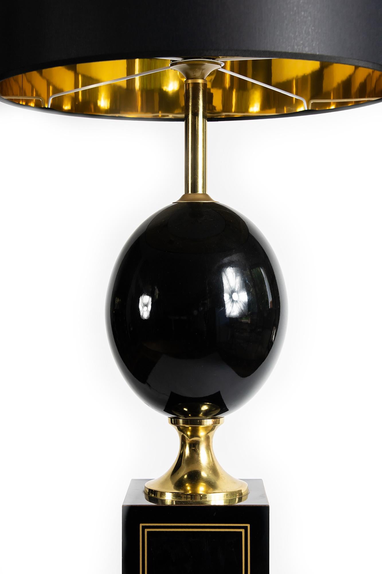 Midcentury French lamp by Maison Le Dauphin designed in rectangular base and glazed ceramic central piece. The lamp is with new made satin finish black color textile shade with gold inside.
Dimensions: High 131 cm (incl. shade), shade high 24 cm