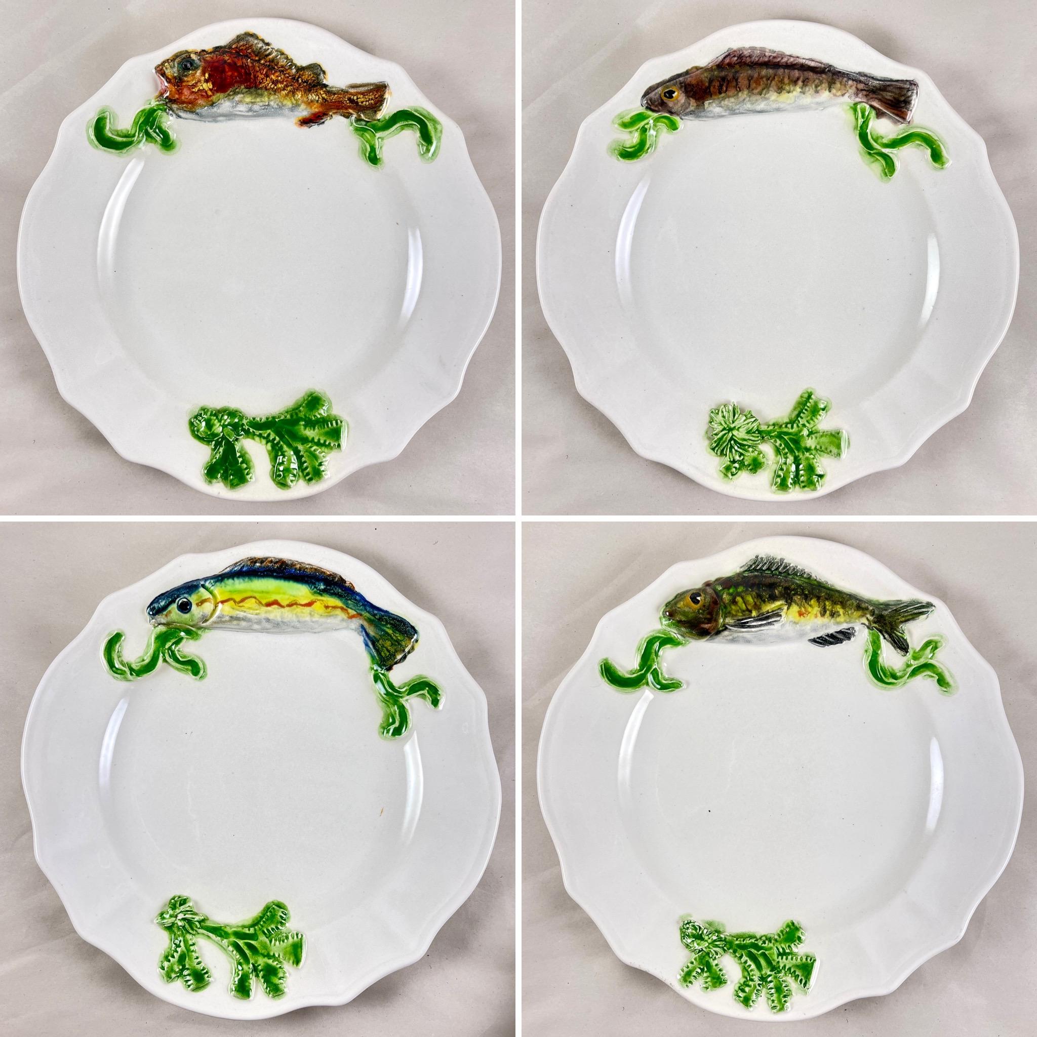 A set of four Mid-Century French pottery fish plates, hand-potted and painted by the ceramist Paulette Quinson, (1899-1984) Marseille, circa 1950-1960s

Beginning in 1924, Quinson ran a well known art pottery studio in Marseille, on the French