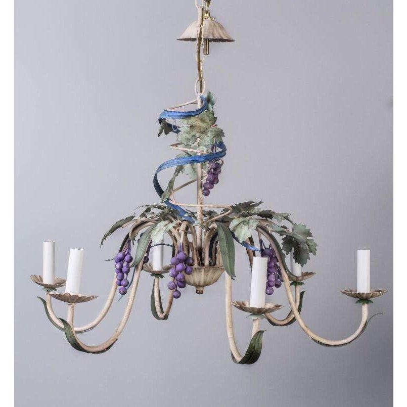 Six lights on scrolled arms ending in floriform candle cups, polychrome painted grapevine decoration. Gorgeous trompe l'oeil blue drapery swirling around the vine. Height of just fixture 18 inches, width 27 inches.
