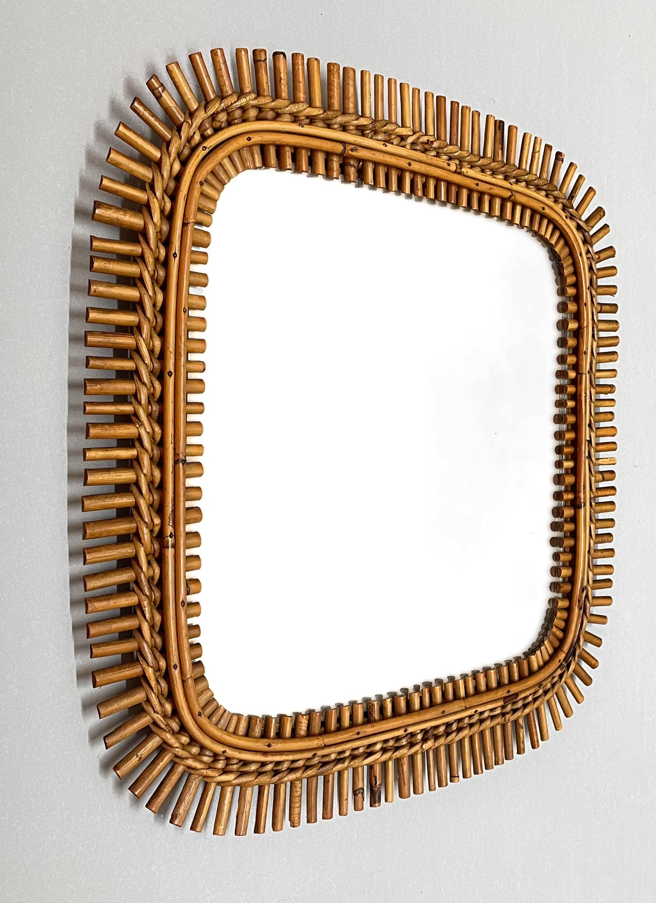 Wonderful Cote d'Azur square midcentury wall mirror with bamboo and rattan frame. It is attributed to the craftmanship of Franco Albini and was designed in France during 1960s.

This amazing mirror is in its original, good vintage conditions. It