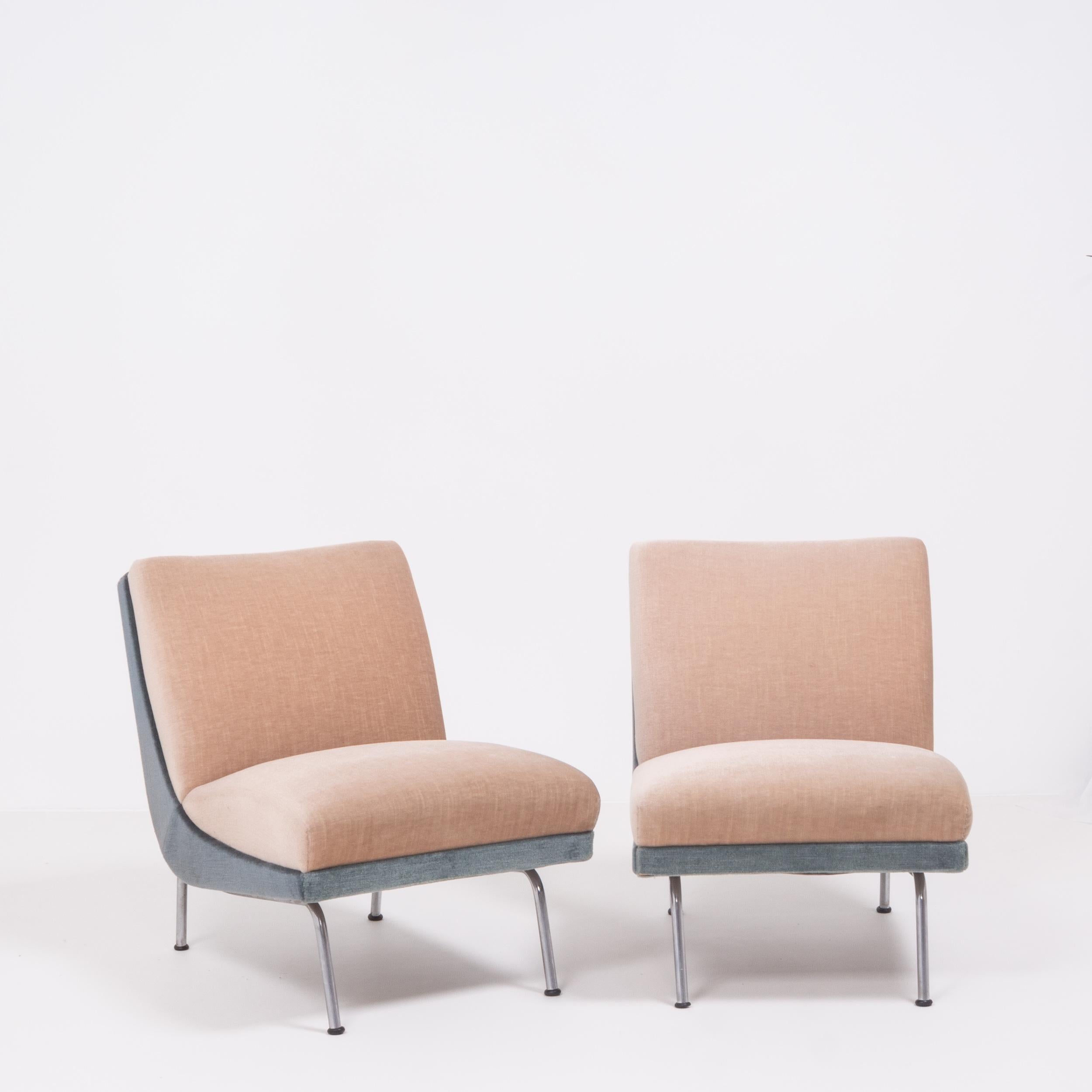 A beautifully designed pair of midcentury lounge chairs in two-tone mohair, manufactured in France.

Upholstered in sea foam green and taupe mohair, the chairs have a curved chrome frame and legs with black rubber foot protectors.
