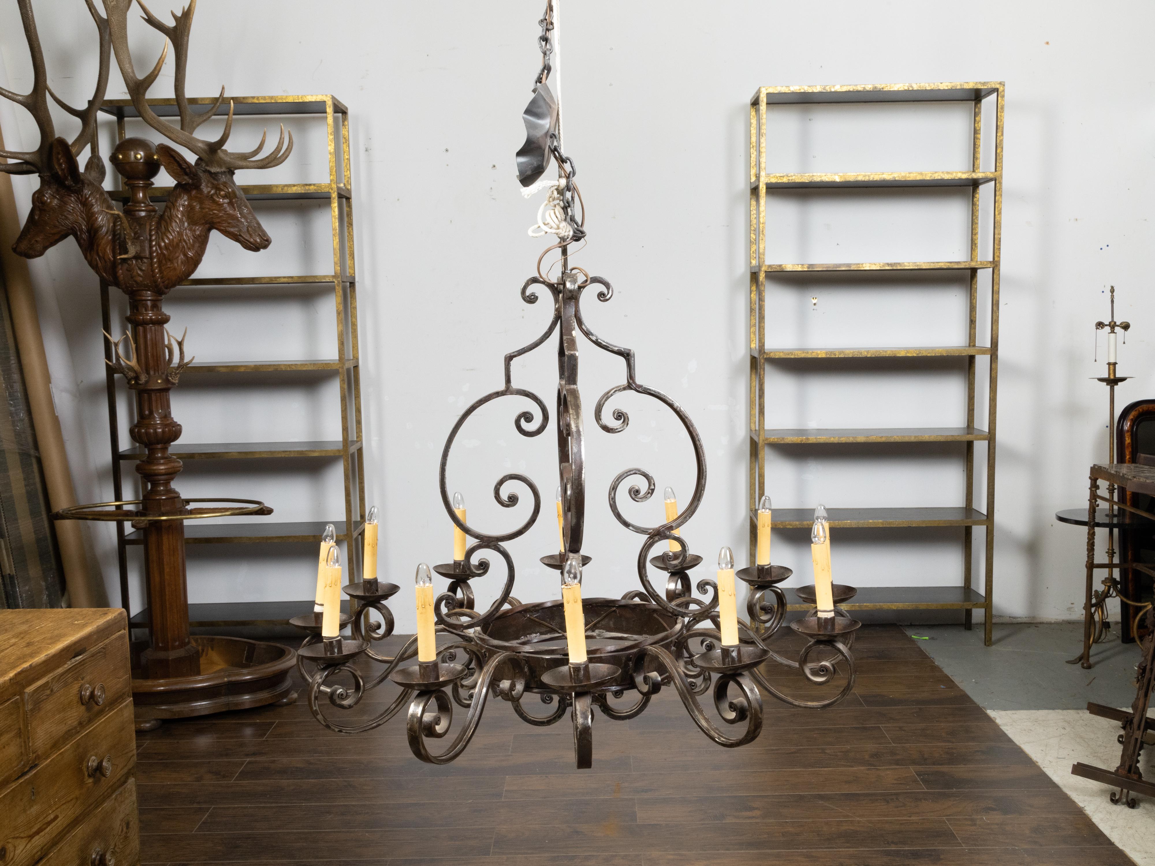 20th Century Midcentury French Steel 12-Light Chandelier with Scrolls and Dark Patina For Sale