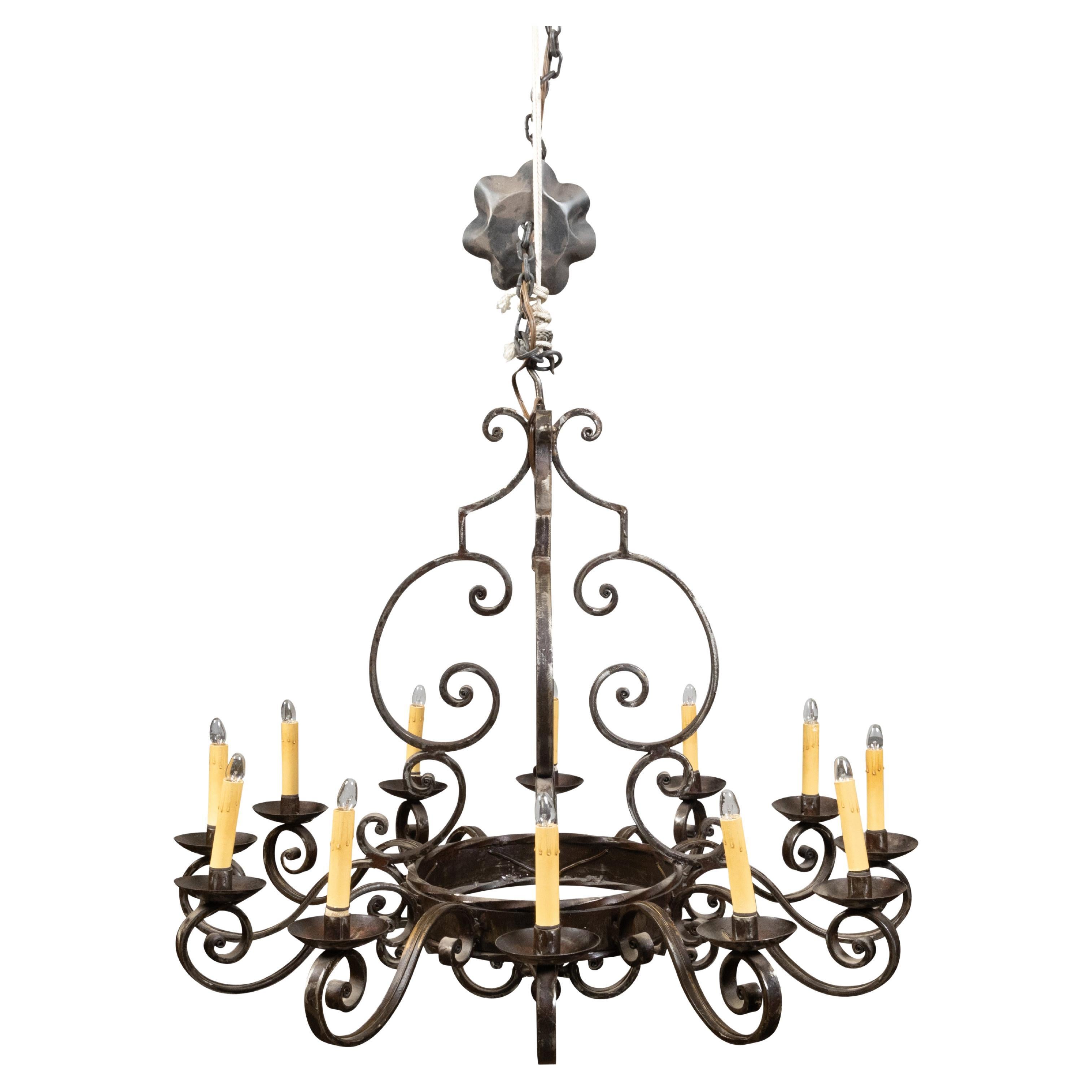 Midcentury French Steel 12-Light Chandelier with Scrolls and Dark Patina For Sale