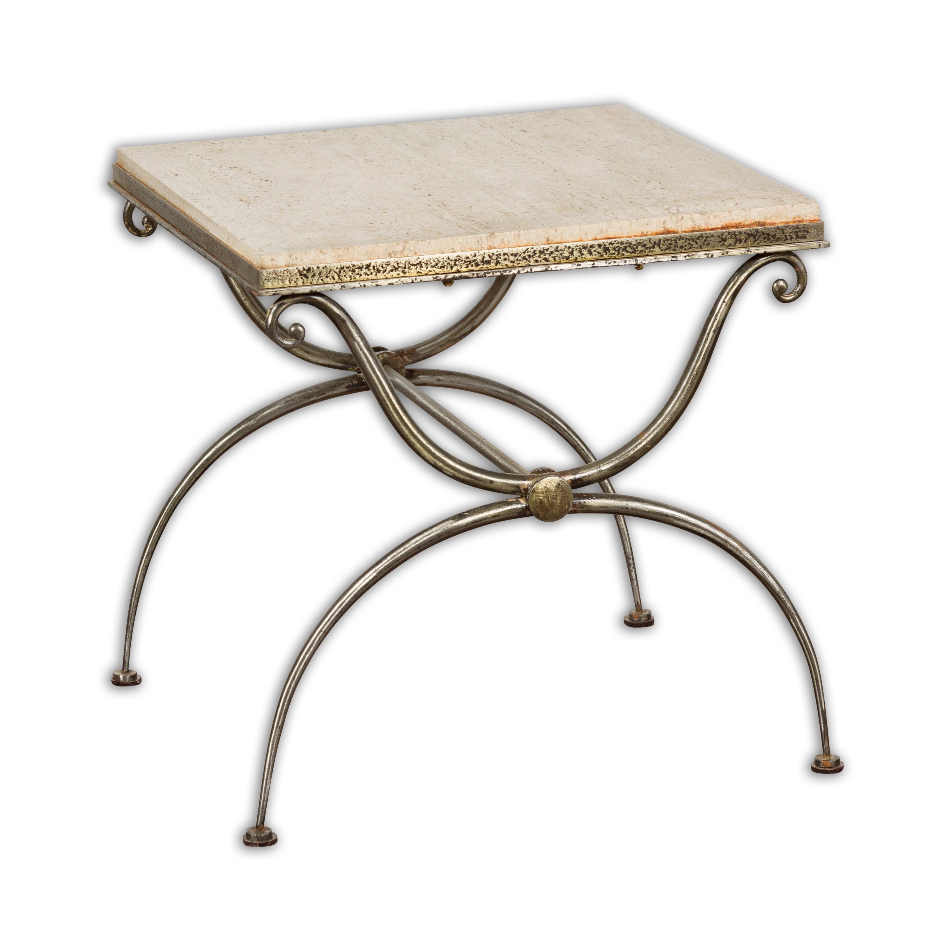 A French Midcentury steel side table with marble top, scrolling supports and arching half-moon legs. A French Midcentury steel side table, reflecting a harmonious blend of form and function in a typical mid-20th-century aesthetic. This piece is