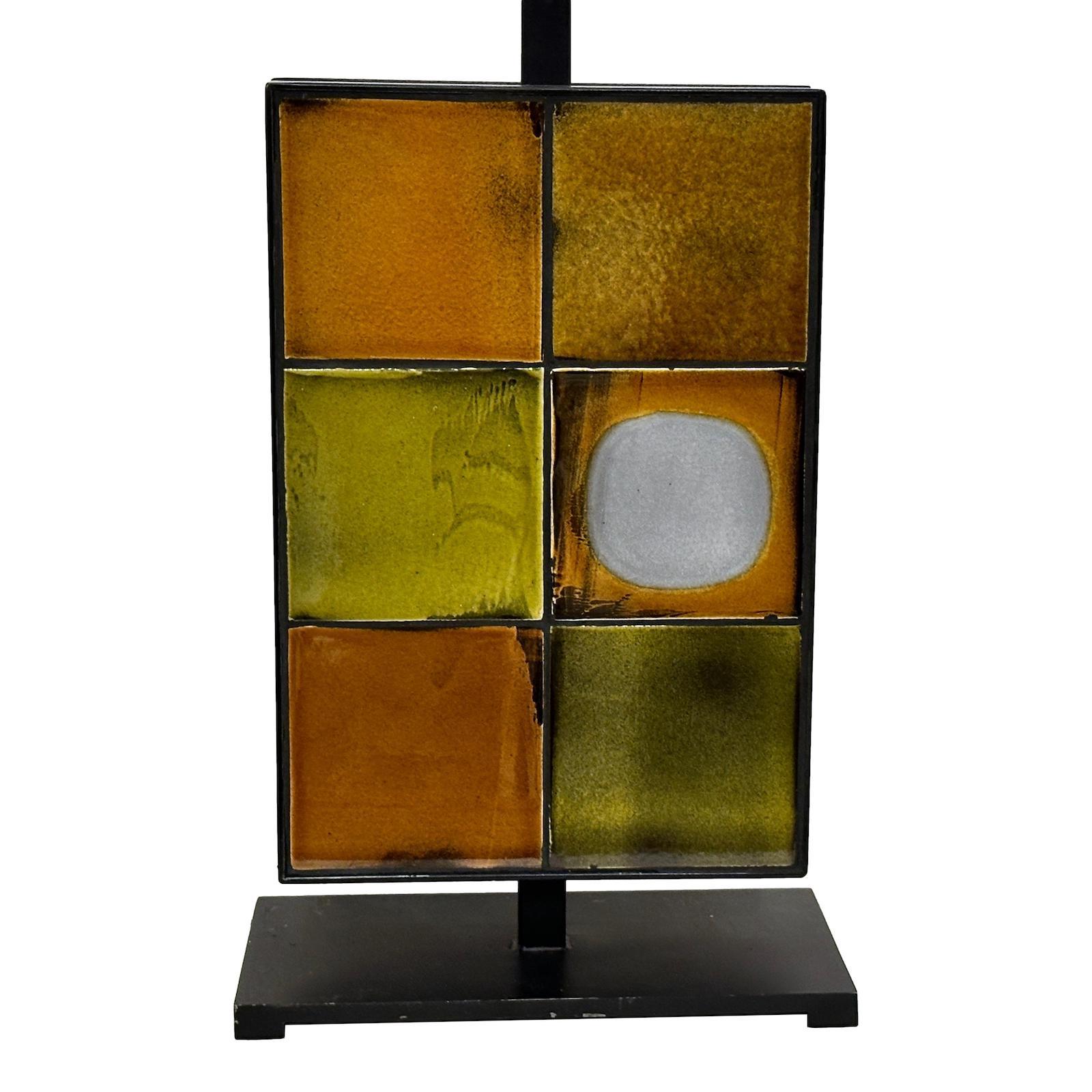 A French circa 1970's lamp with art tiles mounted on both faces.

Measurements:
Height of body: 16