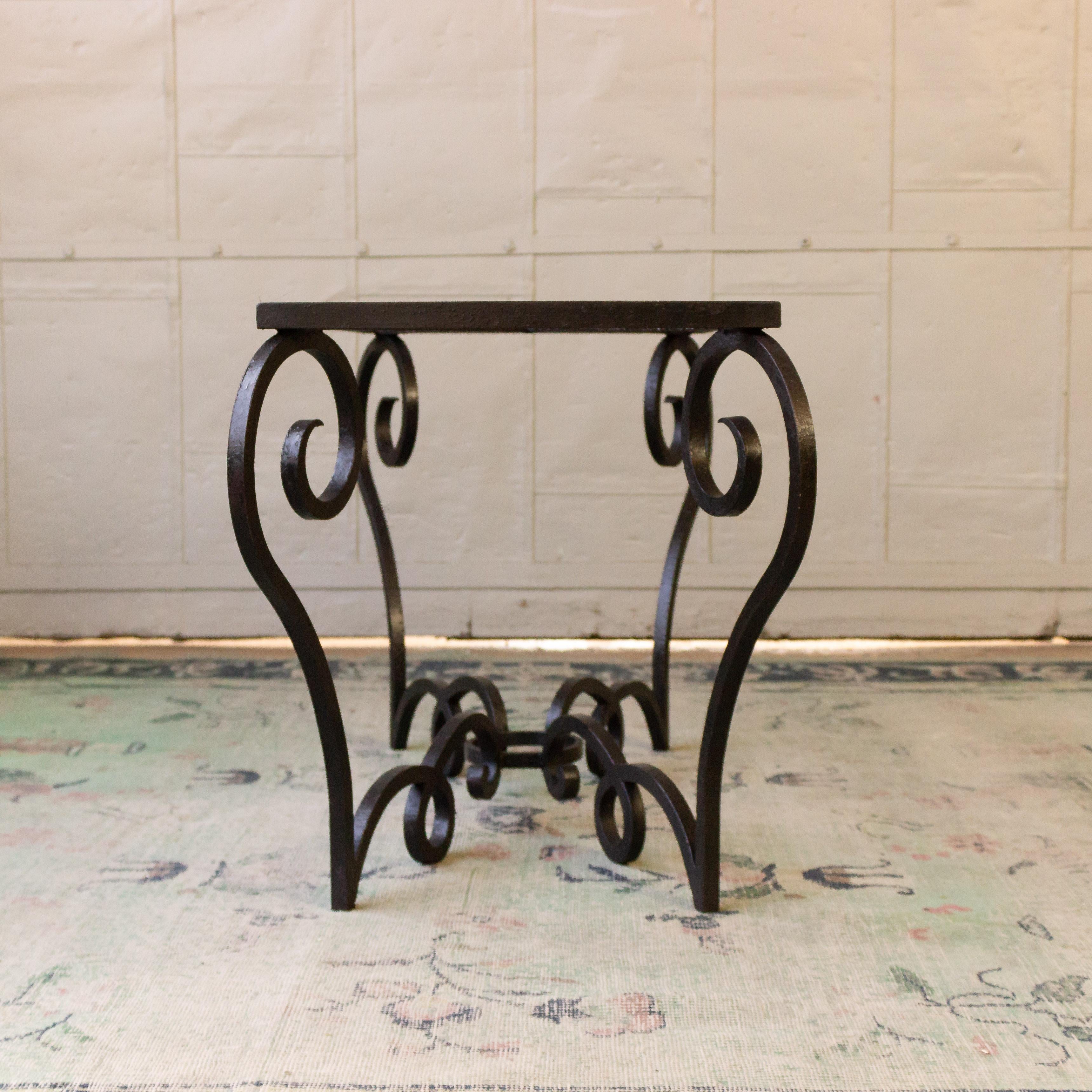 Whimsical wrought iron base coffee table with choice of stone or marble top. In its original form, this table had terracotta tiles as a surface. A replacement stone or marble top is included in the price.