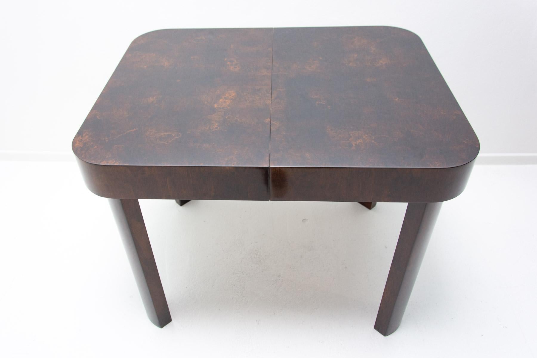 20th Century  Midcentury Fully renovated adjustable walnut dining table by Jindrich Halabala.