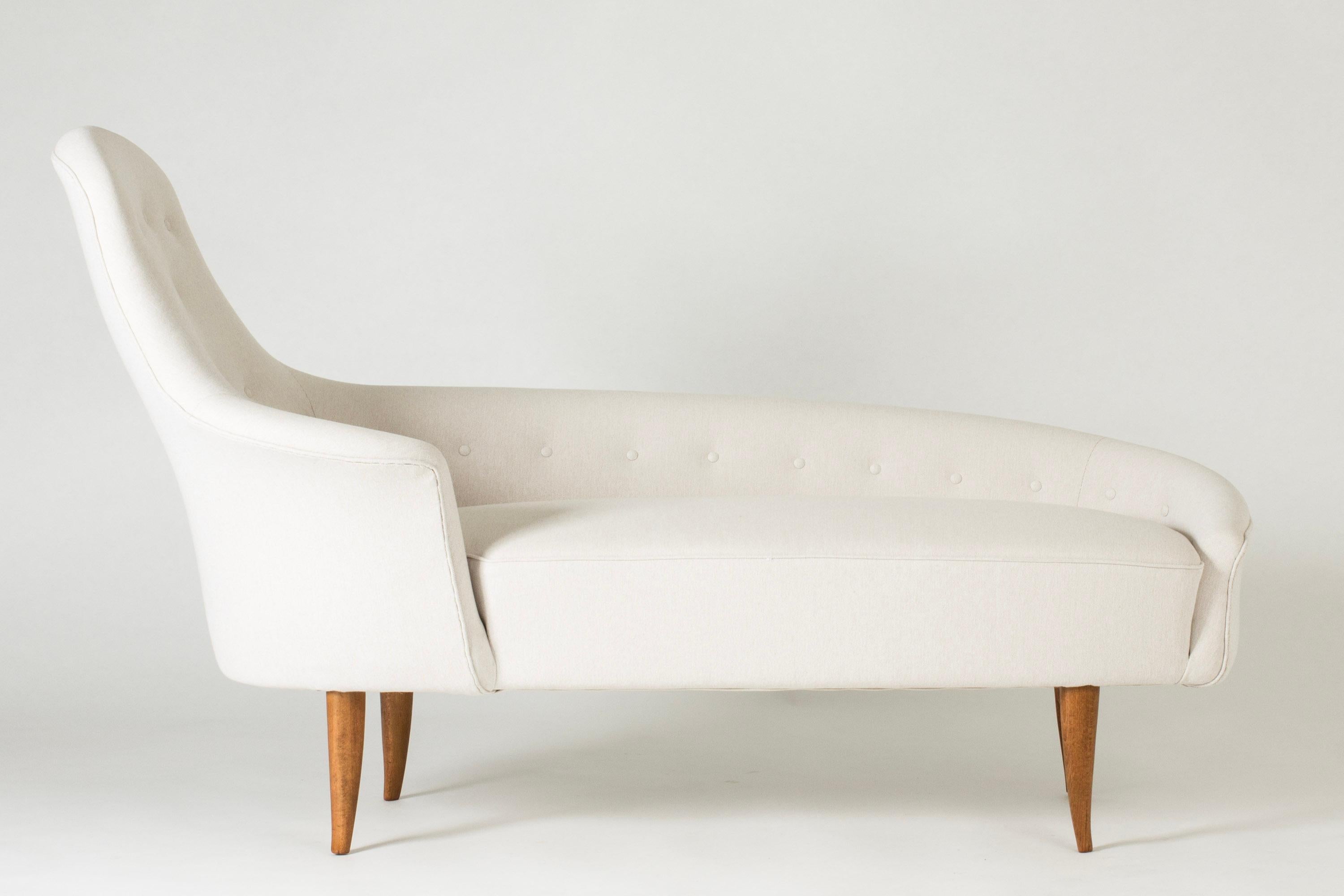 Stunning “Garden of Eden” settee by Kerstin Hörlin-Holmquist, upholstered in eggshell white linen. Beautiful design that strikes a perfect balance between modernism and tradition.

Kerstin Hörlin-Holmquist was one of the first female designers to be