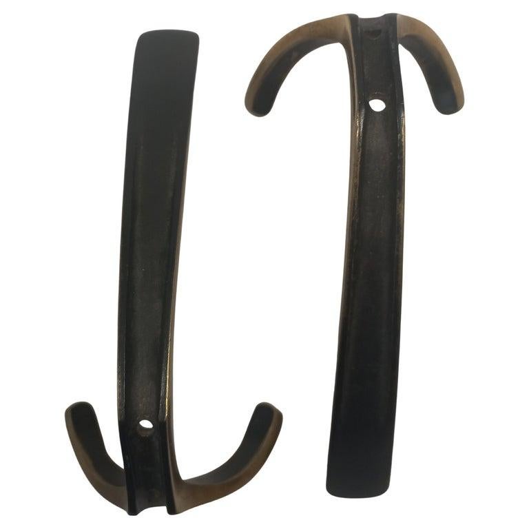 In the style of Carl Auböck, partly black patinated