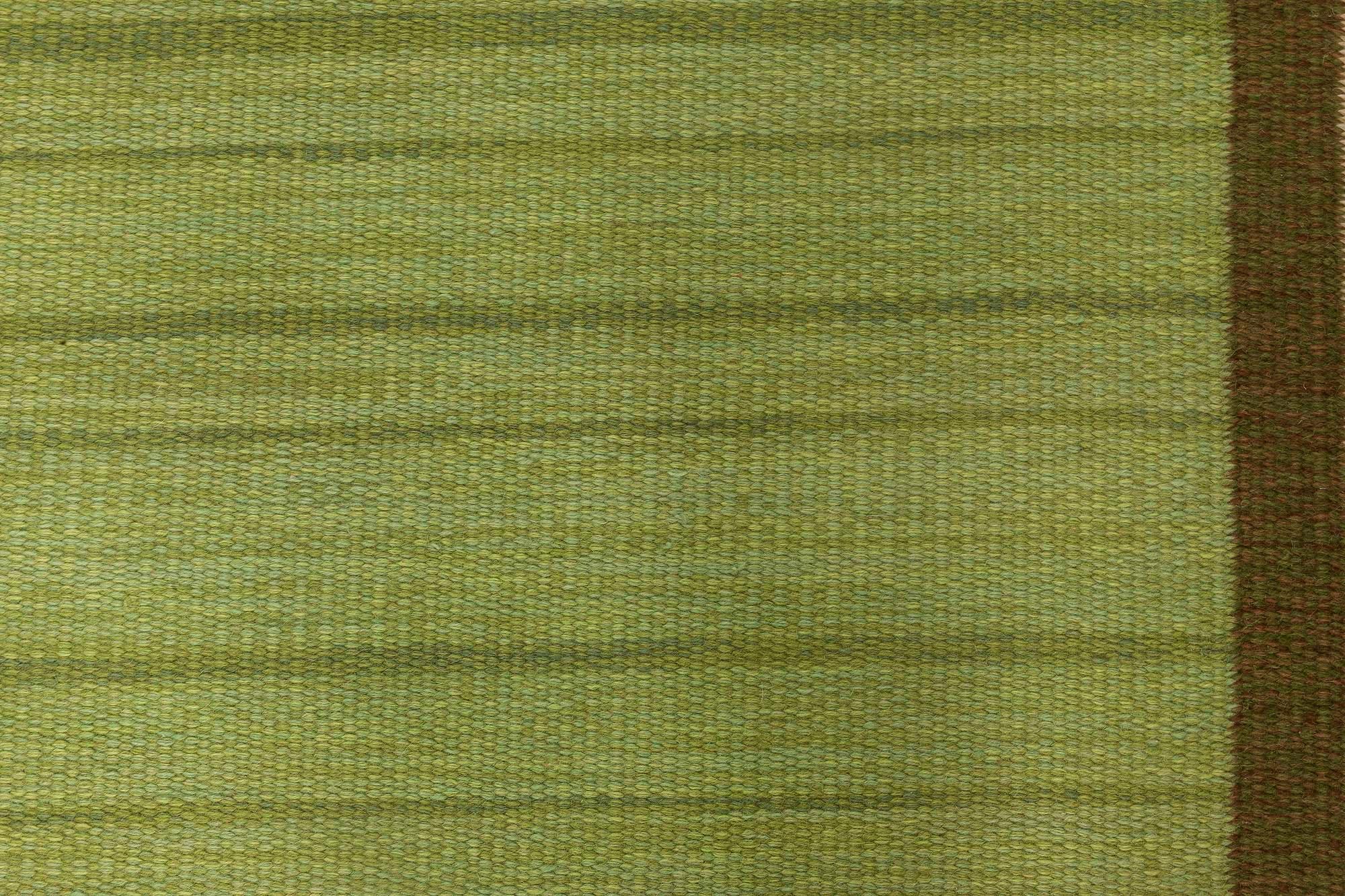 Mid-20th century geometric green yellow Swedish flat-weave rug
Size: 5'4