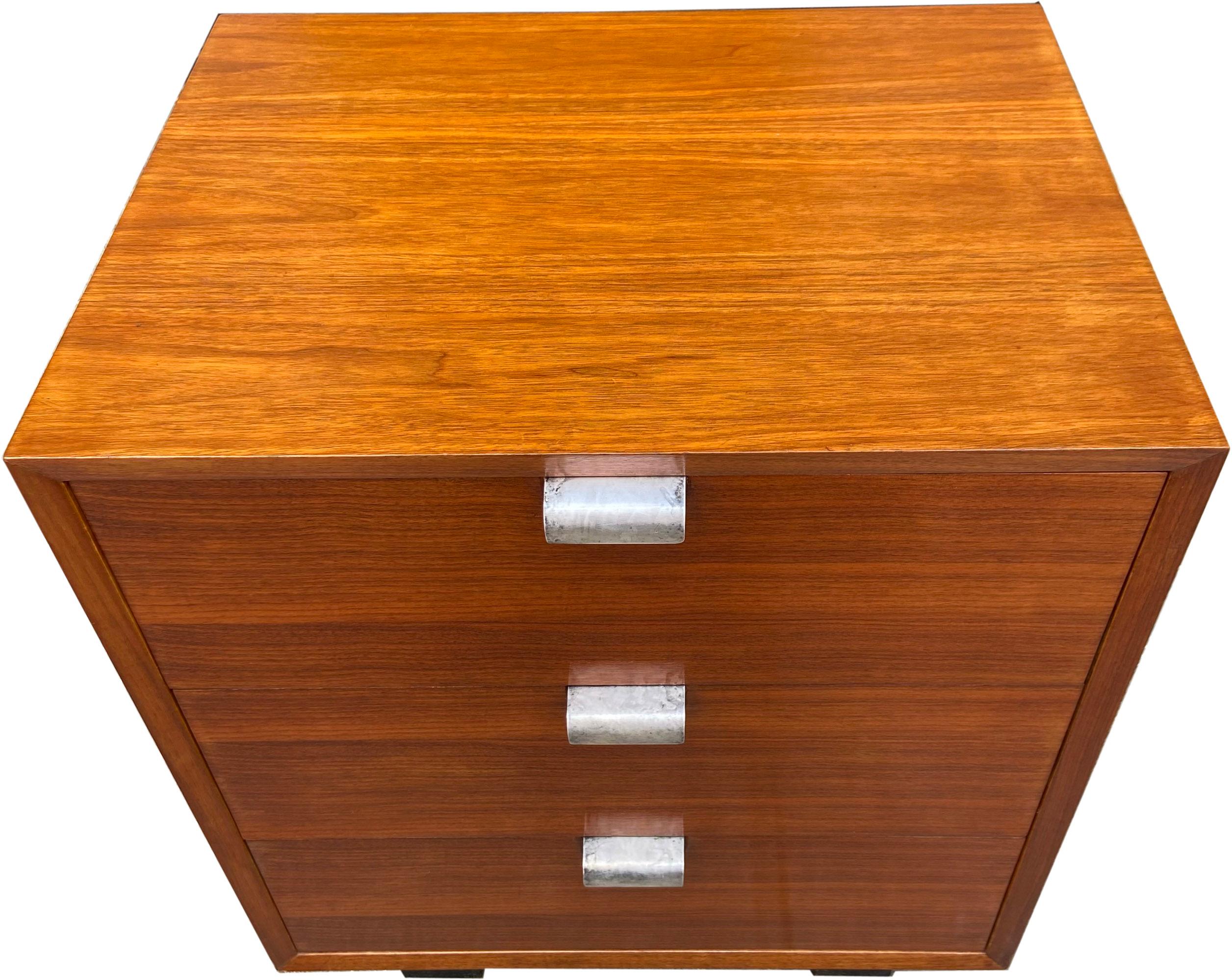 Gorgeous BCS chest of drawers in original walnut finish designed by George Nelson for Herman Miller. This is a very early version with silver plated metal pulls not aluminum. In original condition with honest and beautiful patina. This versatile