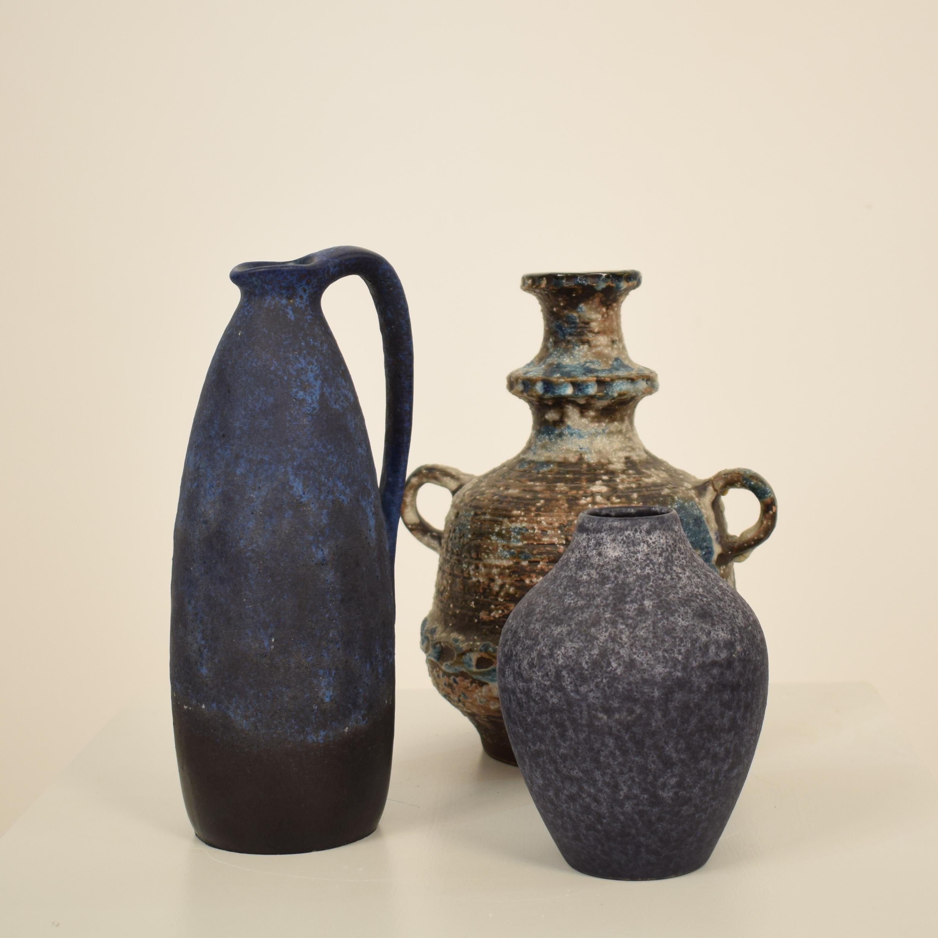 This beautiful midcentury German ceramic vase or Amphora was made in the 1970s. It is glazed in Blue
A unique piece which is a great eyecatcher for your antique, modern, Space Age or midcentury interior.
All pieces are looked after in our own