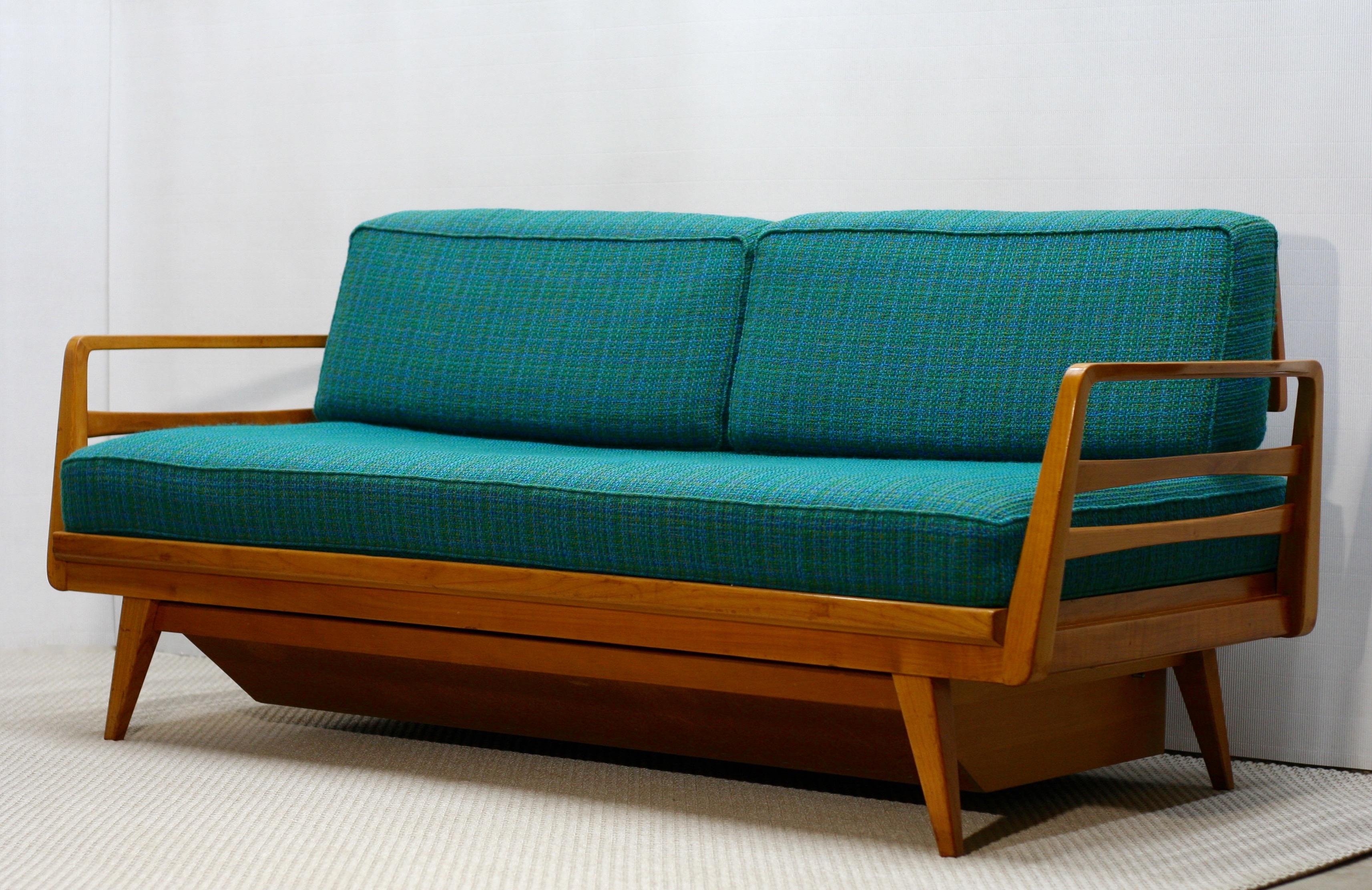 Freestanding model by Walter/Wilhelm Knoll from 1950s. Daybed has an adjustable backrest and an extendable armrest, also it features a box for bedding. Fully original bouclé fabric upholstery with very comfortable spring cushions. 

DAYBED