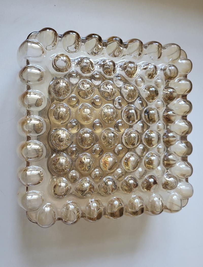 Wonderful sculptural amber bubble glass flushmount.
Germany, 1960s.
Lamp sockets: 1x E27 (US E26).

        