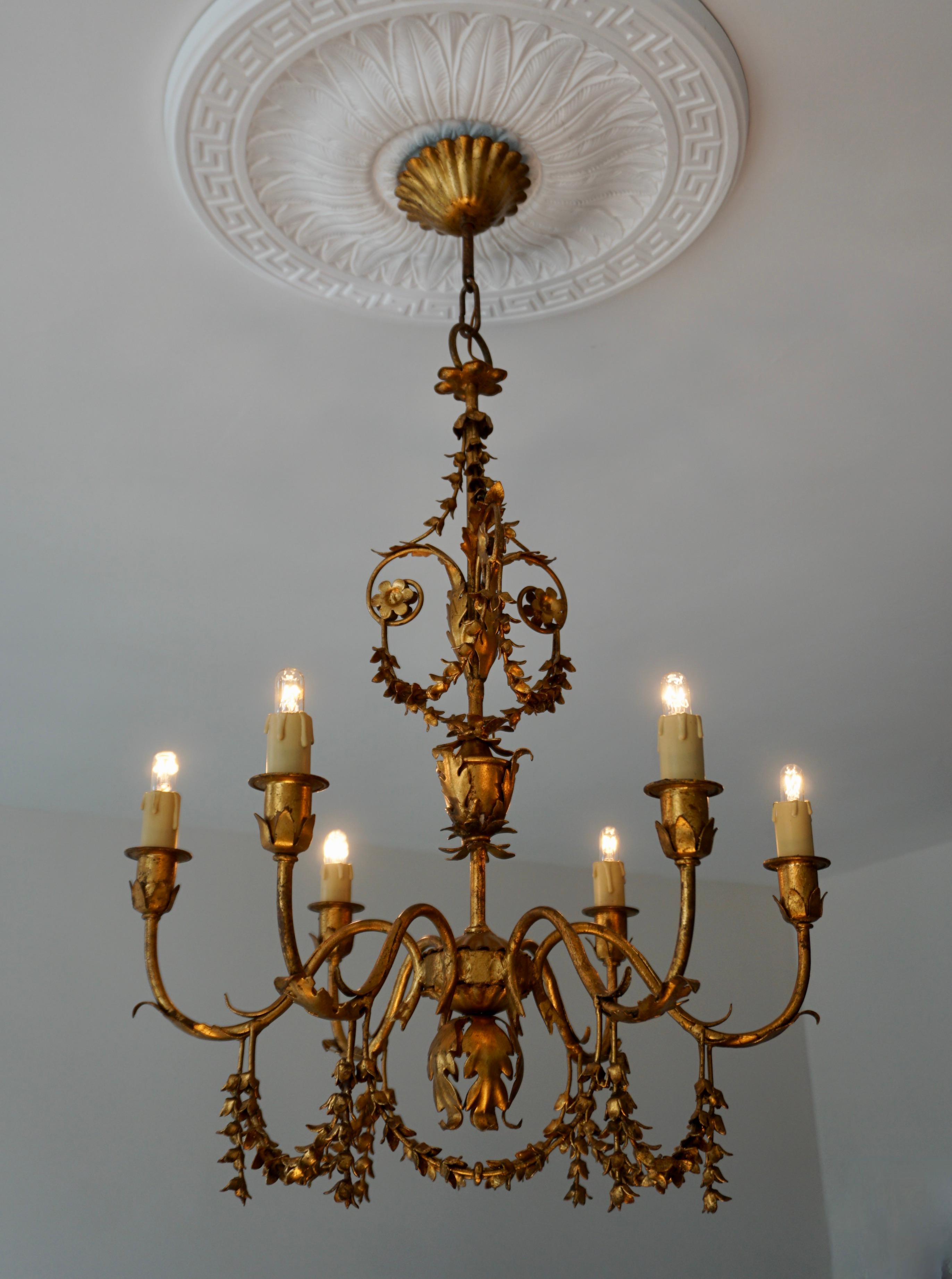 Iconic gilt metal leaf chandelier with six Edison (E14) fittings.

Diameter 18