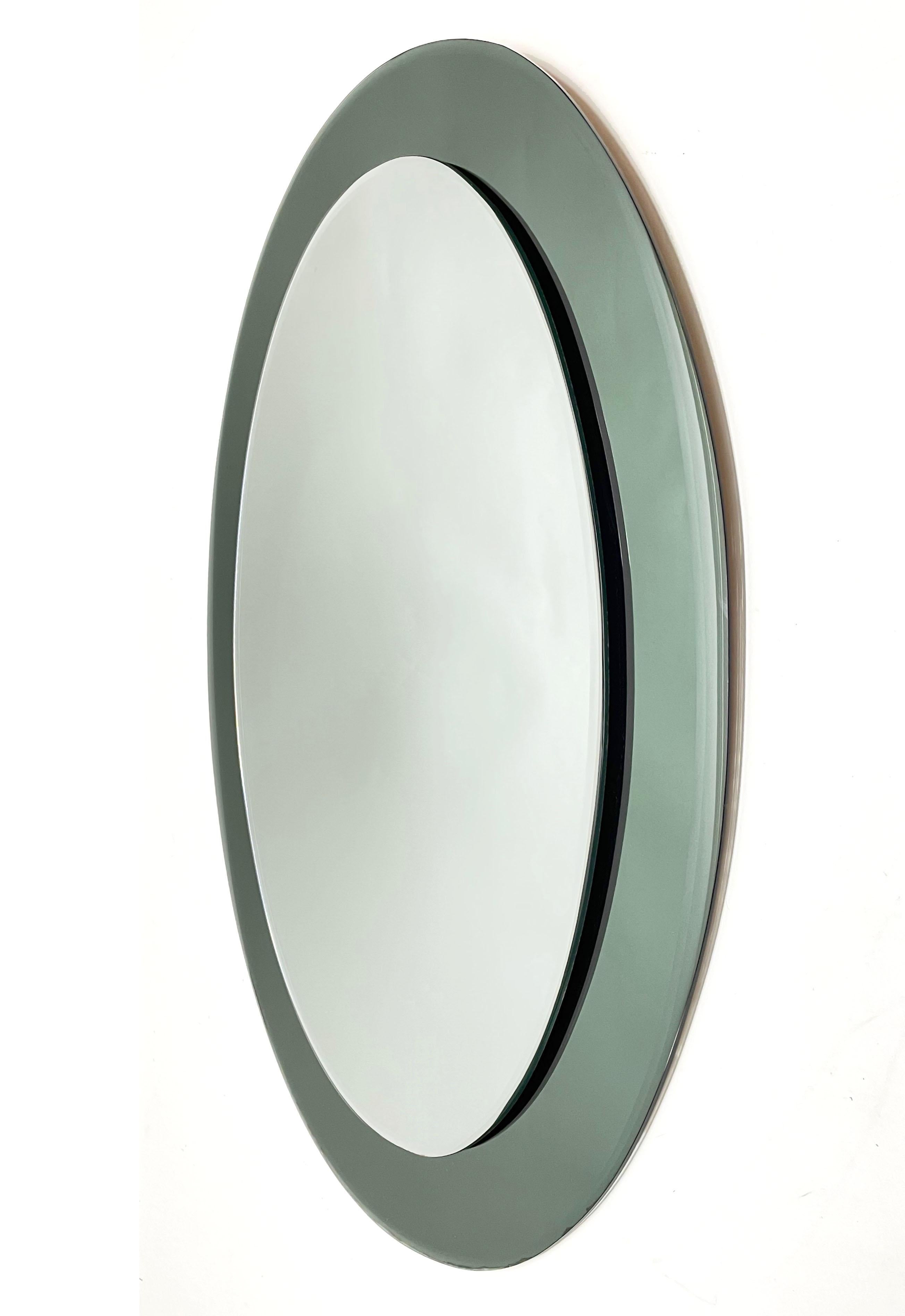 Italian Midcentury Glass Framed Oval Wall Mirror Attributed to Cristal Art, Italy, 1960s