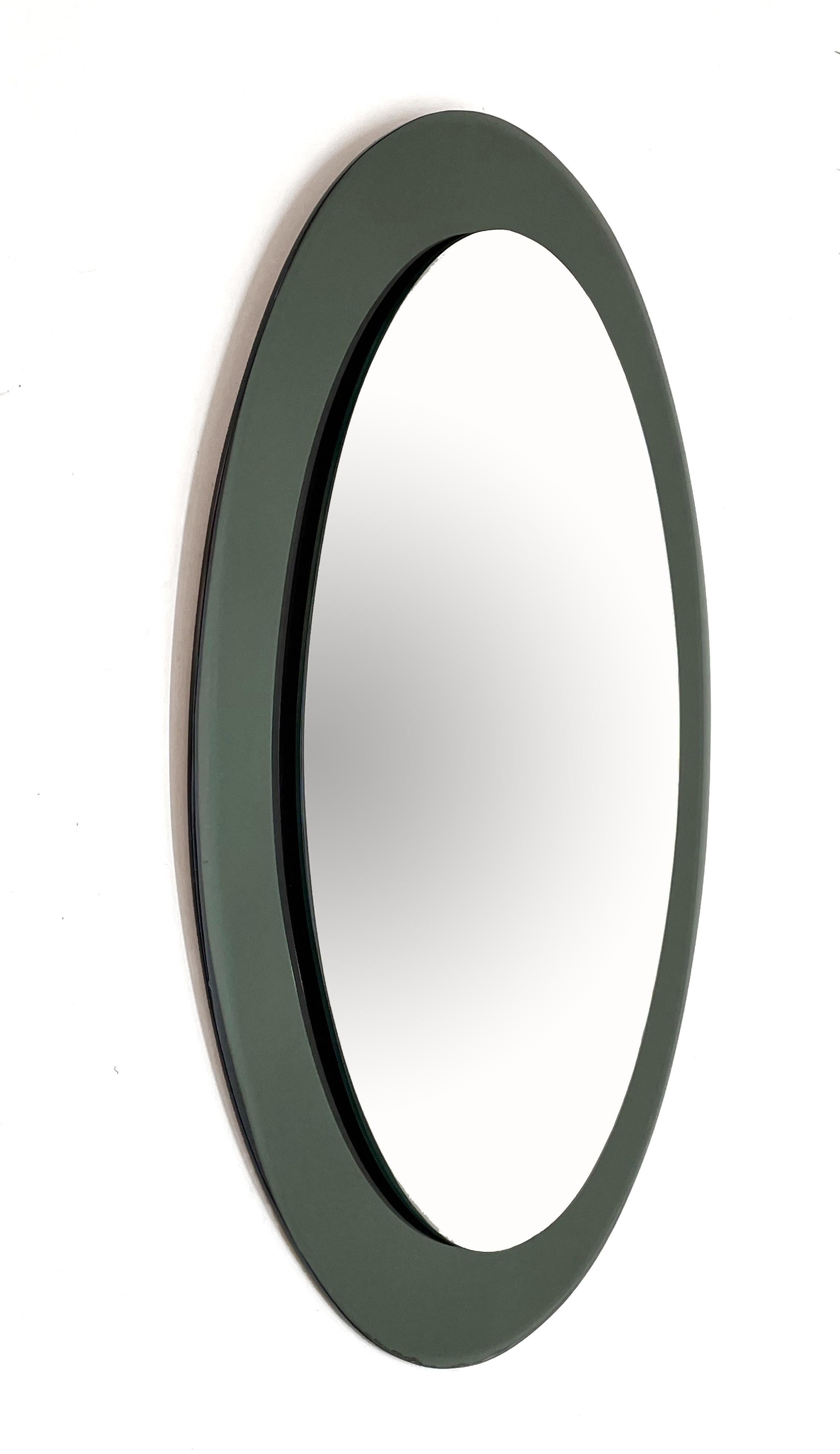 Midcentury Glass Framed Oval Wall Mirror Attributed to Cristal Art, Italy, 1960s In Good Condition In Roma, IT