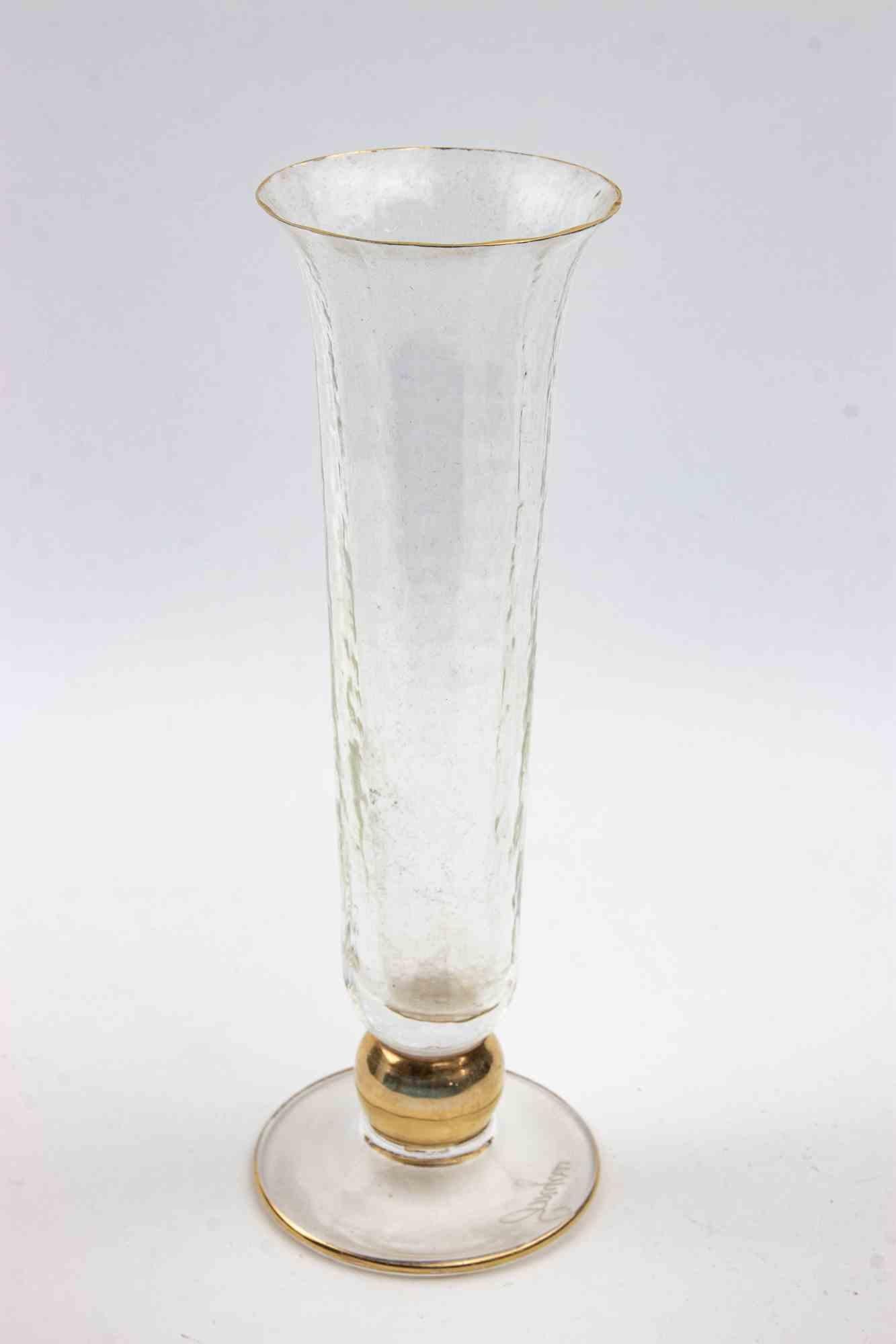 Vaso in vetro di metà secolo con sovrapposizioni dorate realizzato a metà del XX secolo.

Firmato con acido sulla base.

Condizioni eccellenti.