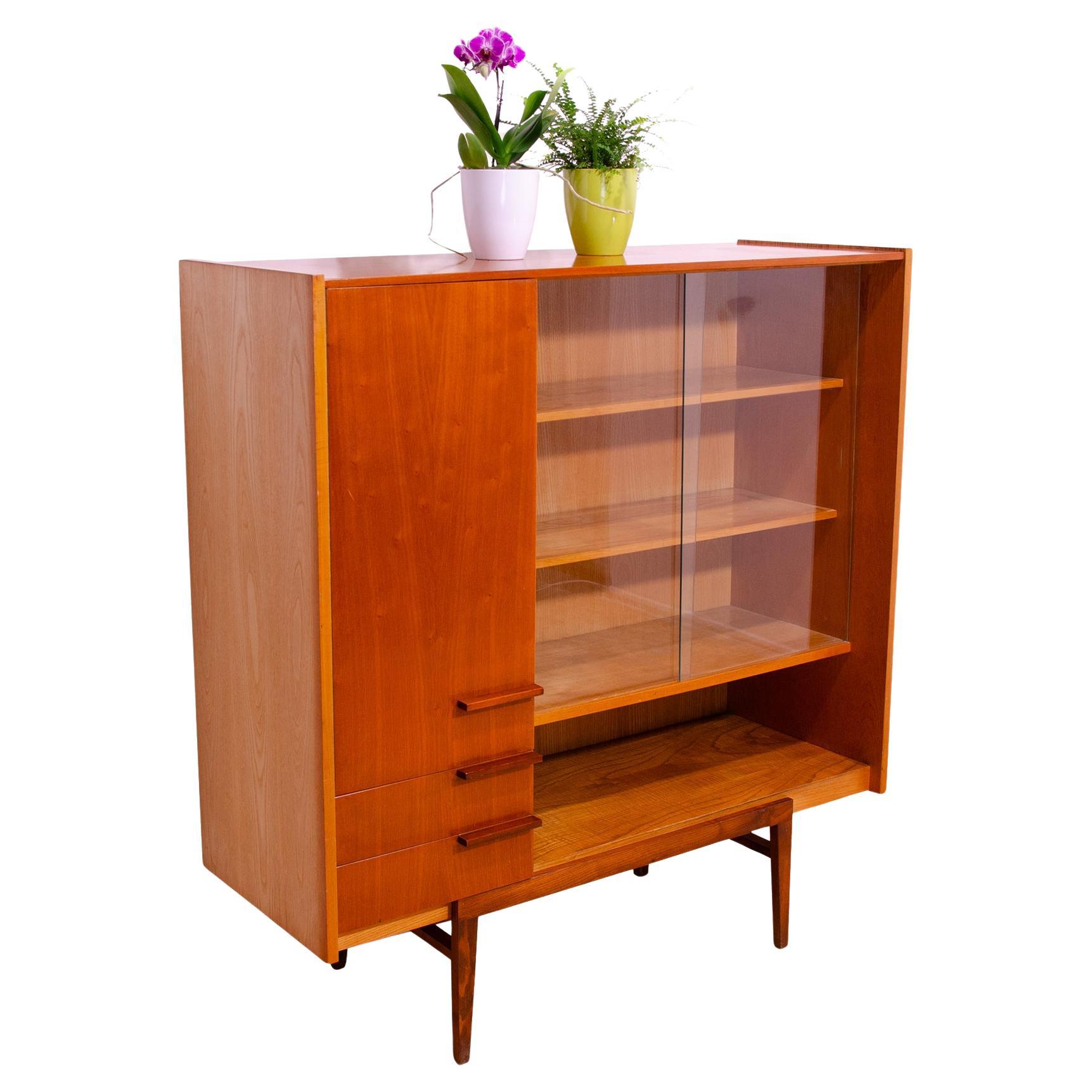 Mid century Czechoslovak Library cabinet, designed by František Mezulánik and produced by ÚP Závody in the 1960´s. Material: beech wood, ash wood, plywood, glass.

The cabinet is in its very good original condition with signs of age and