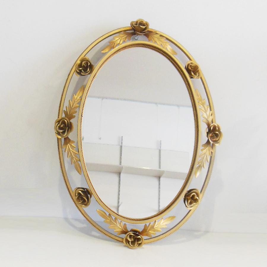 The mirror was created with light
It can be illuminated or not. It is very beautiful without light and with it

It has a light on the back.
It can be illuminated or left as well as any mirror

Midcentury Spanish mirror with leaves and roses. It is