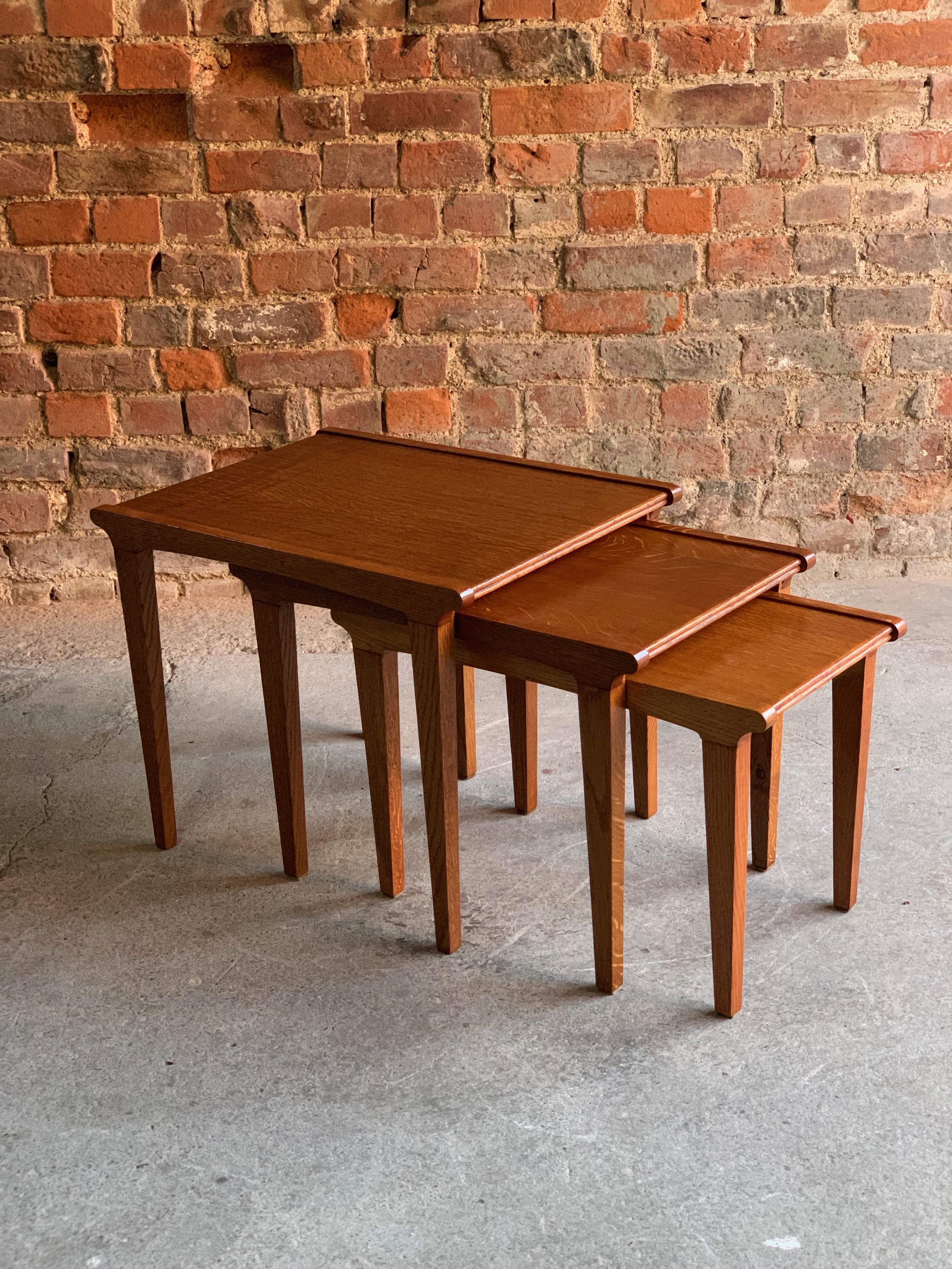Gordon Russel golden oak nest of tables midcentury, circa 1950

Gordon Russell, mid-20th century light oak nest of three tables, circa 1950, with raised crossgrain borders and tapering rectangular legs, Provenance: purchased by the vendor's family