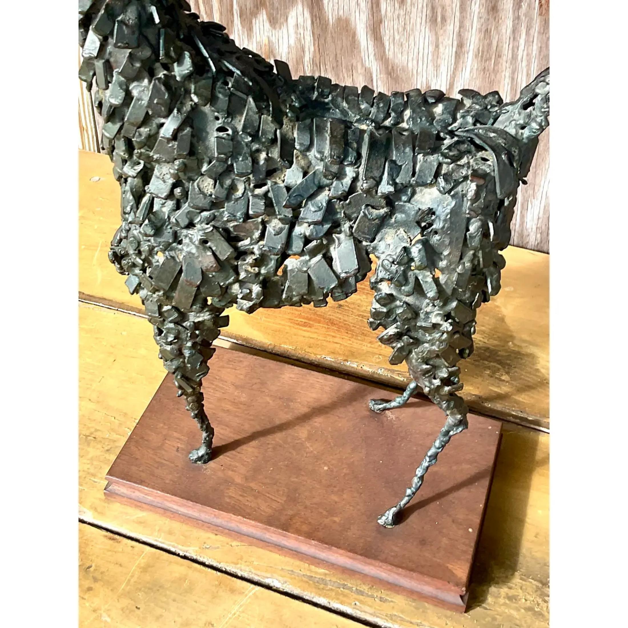 Fantastic tall Midcentury llama sculpture. Beautiful metal construction in a chic slender design. Signed The Gould Collection on the bottom. Acquired from a Plm Beach estate