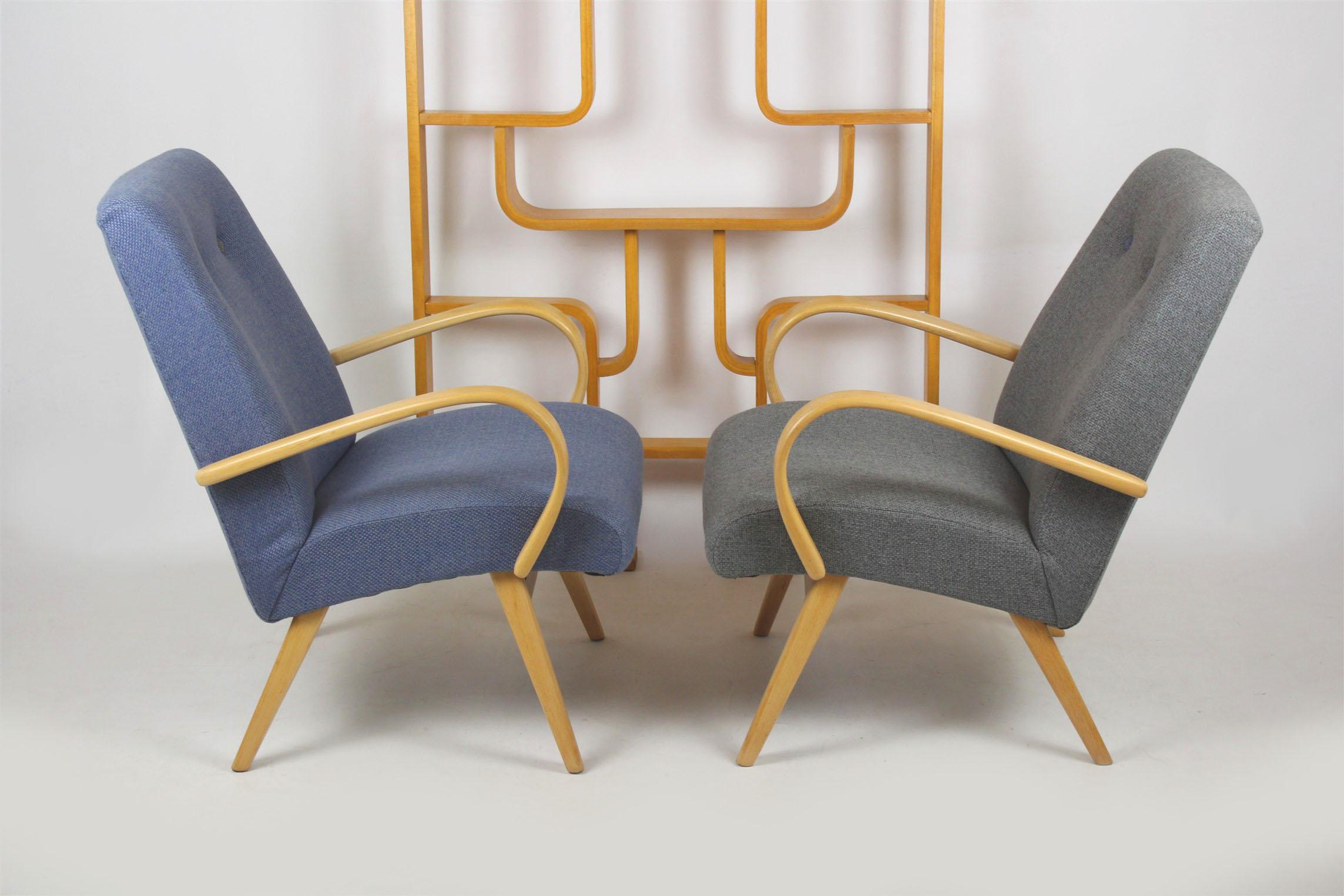 A pair of armchairs from the mid-1960s, made in former Czechoslovakia. Armrests made out of beech bentwood.
Chairs are fully restored (upholstered in fabric, satin lacquered woodwork).