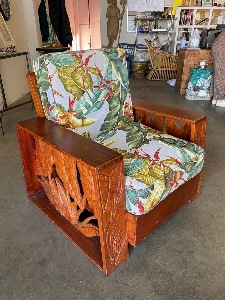 Midcentury Hawaiian Koa three-tier mahogany side table with hand-carved bamboo pattern accenting the front and side and matching Koa wood lounge chair with hand-carved bamboo pattern accenting the side.  

Chair: 32