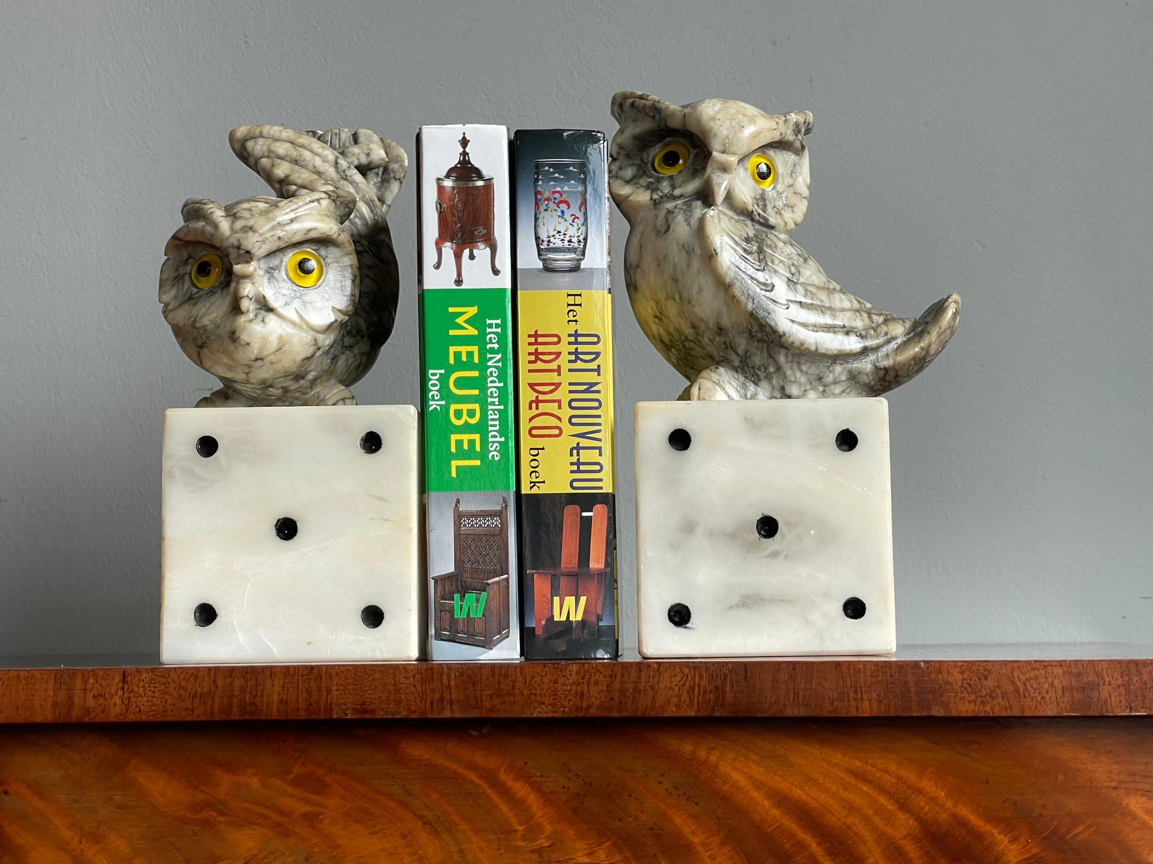 Beautiful, meaningful, practical and decorative mid-century bookends.

Given the fact that owls are the international symbol for wisdom and learning, these are the perfect sculptures for book-ends. These fine sized, hand-sculpted marble owls are