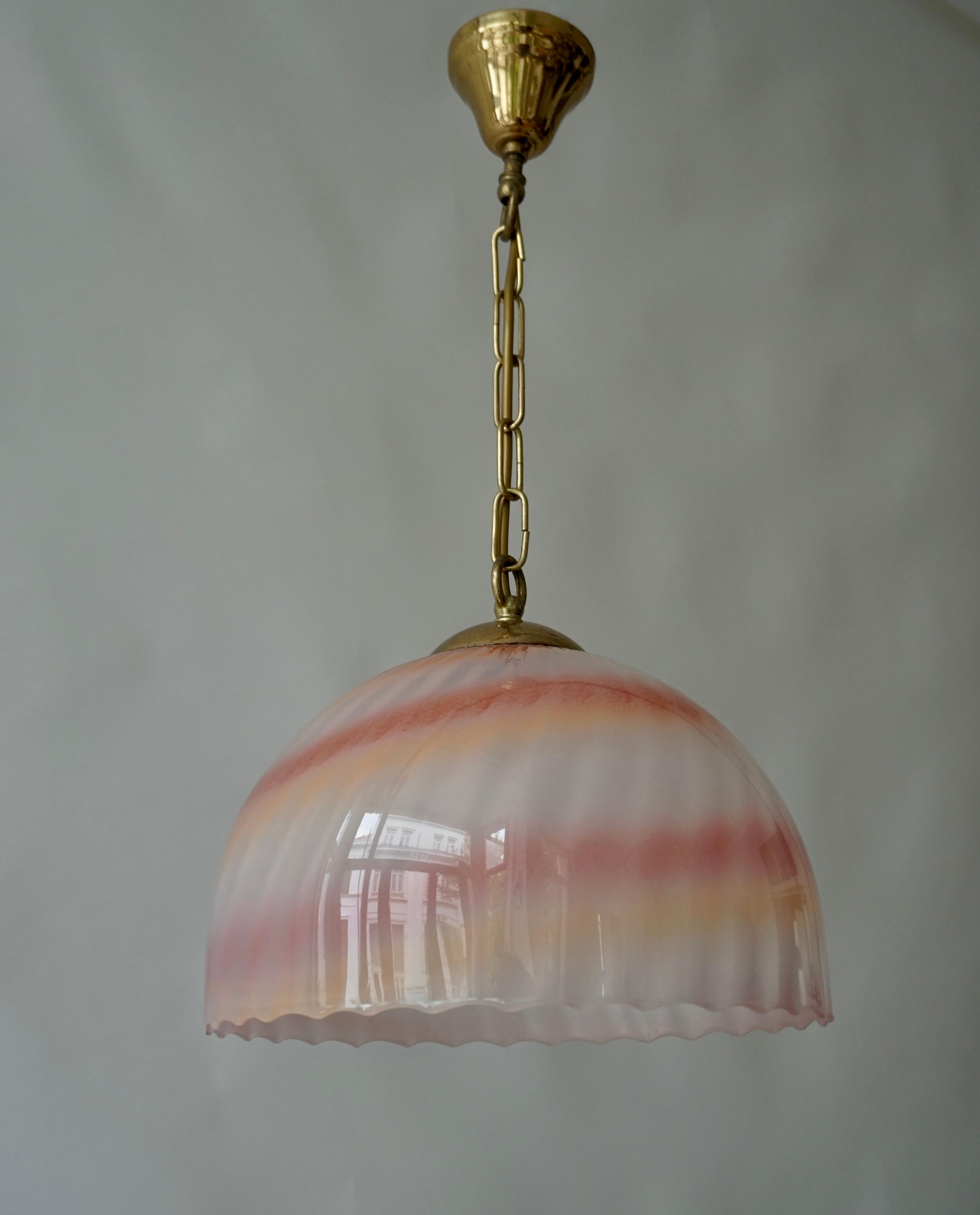 Mid century beautiful pendant light in dust pink colored murano handblown glass .  
Made in Italy in the 1970s.  

Perfect to hang over your kitchen bench, dining room table or entry foyer. 
 
The glass structure has a 27 cm diameter and is 22 cm